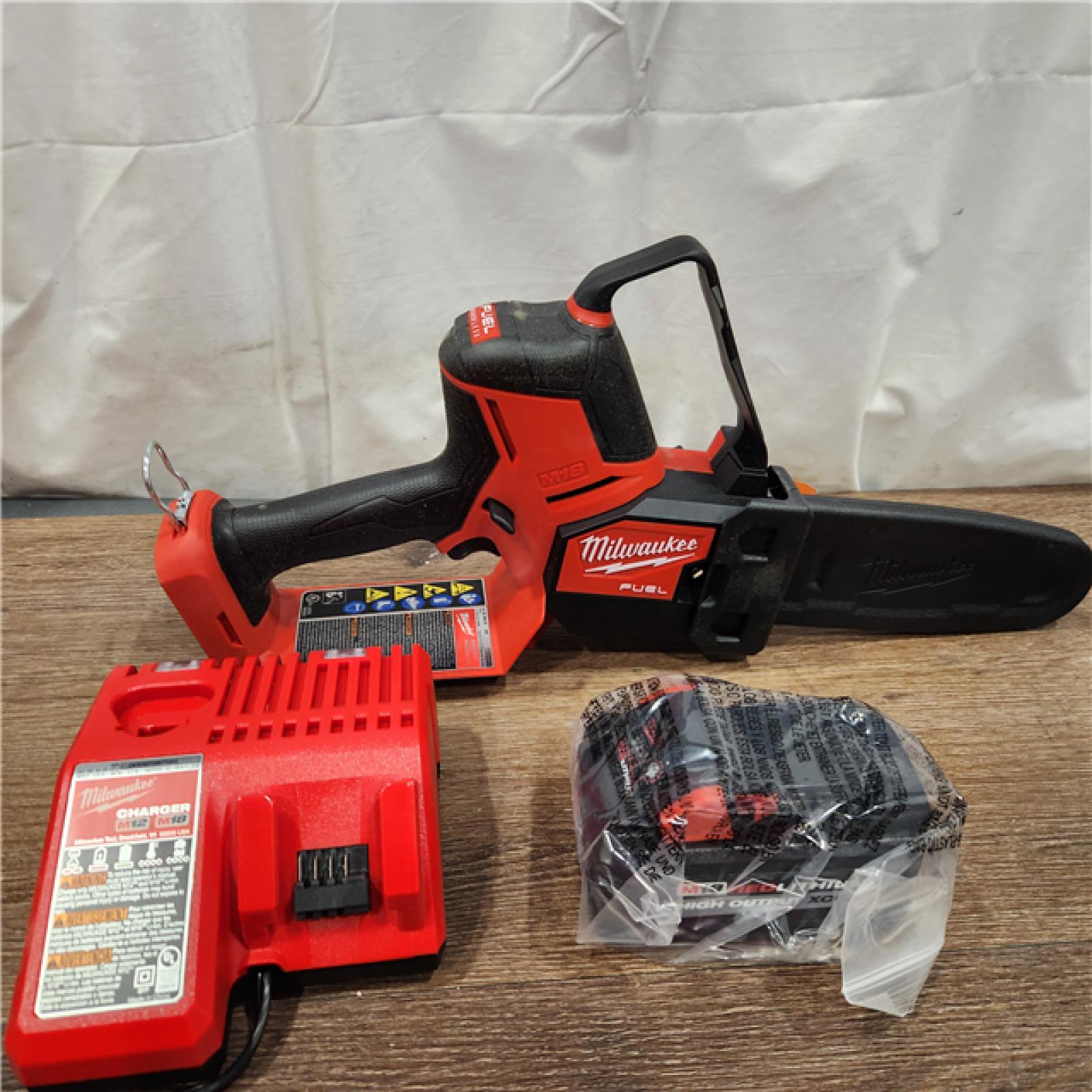 AS-IS M18 FUEL 8 in. 18V Lithium-Ion Brushless HATCHET Pruning Saw Kit with 6Ah High Output Battery and Charger