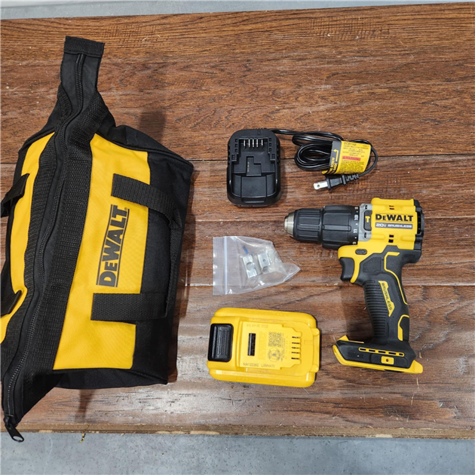 AS-IS DEWALT ATOMIC 20-Volt Lithium-Ion Cordless 1/2 in. Compact Hammer Drill with 3.0Ah Battery, Charger and Bag