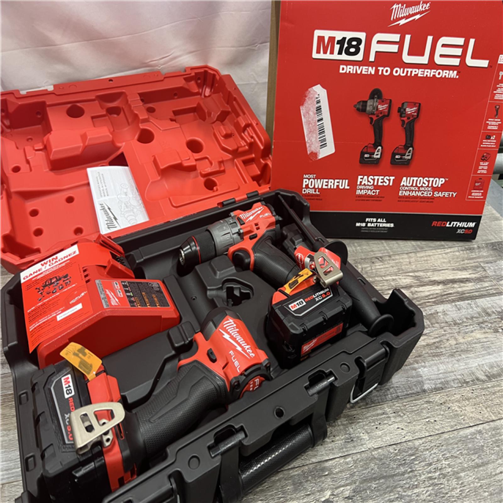 AS-IS MILWAUKEE M18 FUEL 18V Lithium-Ion Brushless Cordless Hammer Drill and Impact Driver Combo Kit (2-Tool) with 2 Batteries