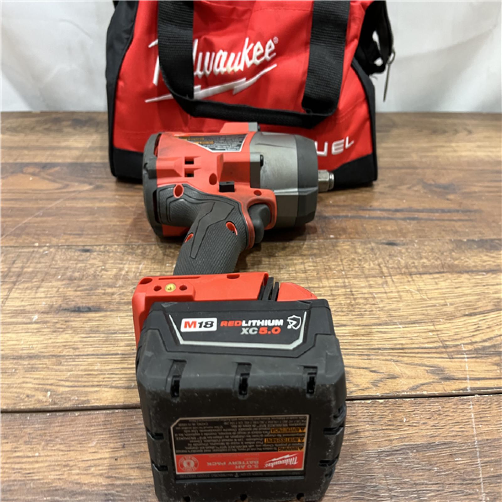 AS IS Milwaukee M18 1/2 in. Cordless Brushless High Torque Impact Wrench Kit (Battery & Charger)