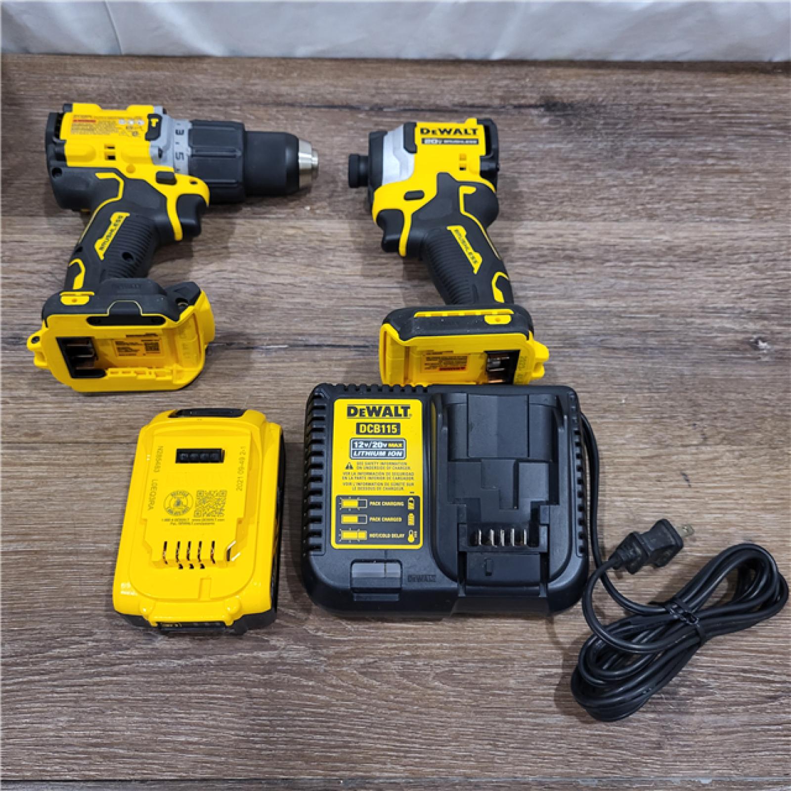 AS-IS 20V MAX XR Hammer Drill and ATOMIC Impact Driver 2 Tool Cordless Combo Kit with (2) 4.0Ah Batteries, Charger, and Bag