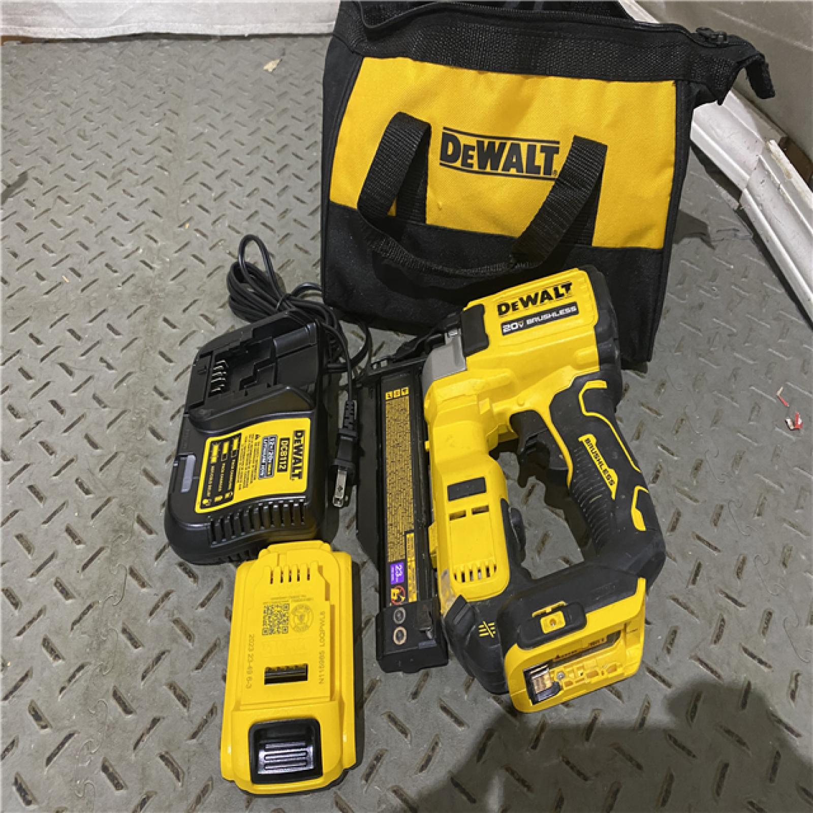 Houston location AS-IS DEWALT ATOMIC 20V MAX Lithium Ion Cordless 23 Gauge Pin Nailer Kit with 2.0Ah Battery and Charger