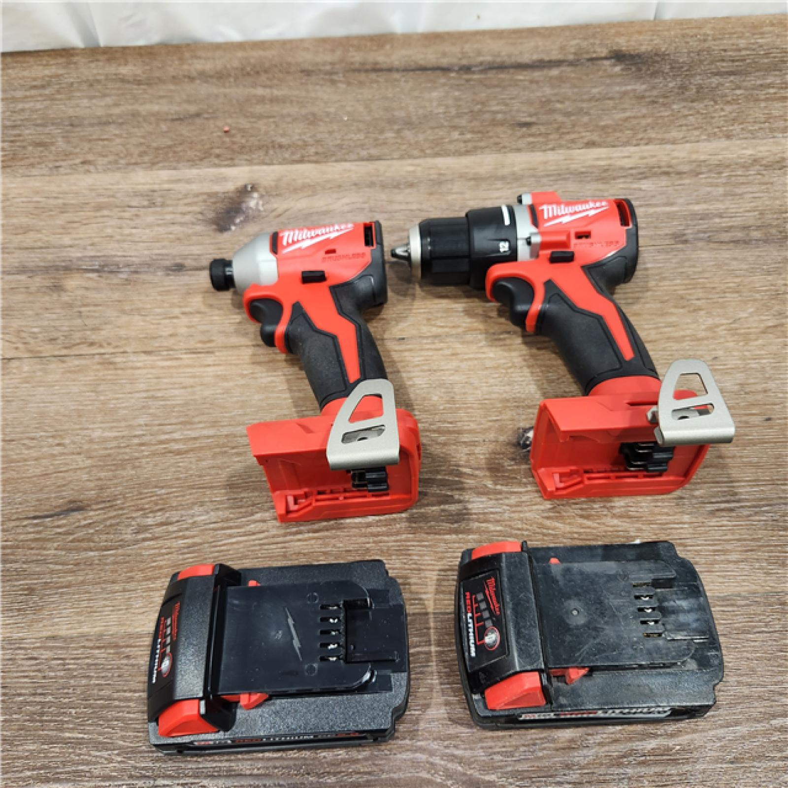 AS-IS M18 18V Lithium-Ion Brushless Cordless Compact Drill/Impact Combo Kit (2-Tool) W/(2) 2.0 Ah Batteries, Charger & Bag