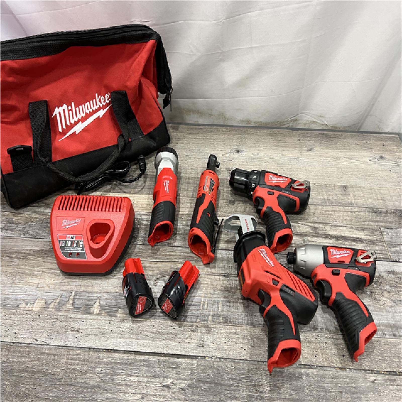 AS-IS MILWAUKEE M12 12V Lithium-Ion Cordless Combo Kit (5-Tool) with Two 1.5 Ah Batteries, Charger and Tool Bag