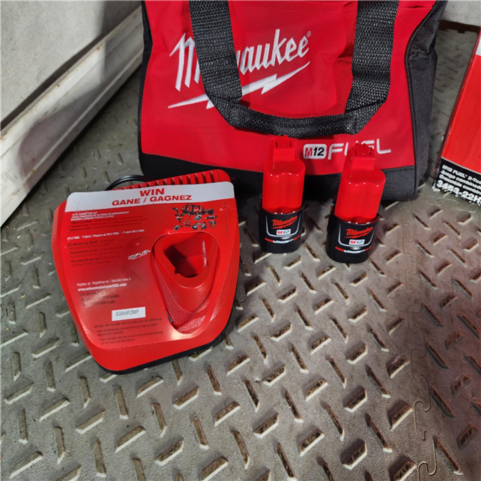 HOUSTON LOCATION - AS-IS (APPEARS LIKE NEW) Milwaukee M12 FUEL Brushless Cordless 1/4inch Hex Impact Driver with 3/8inch Ratchet Kit