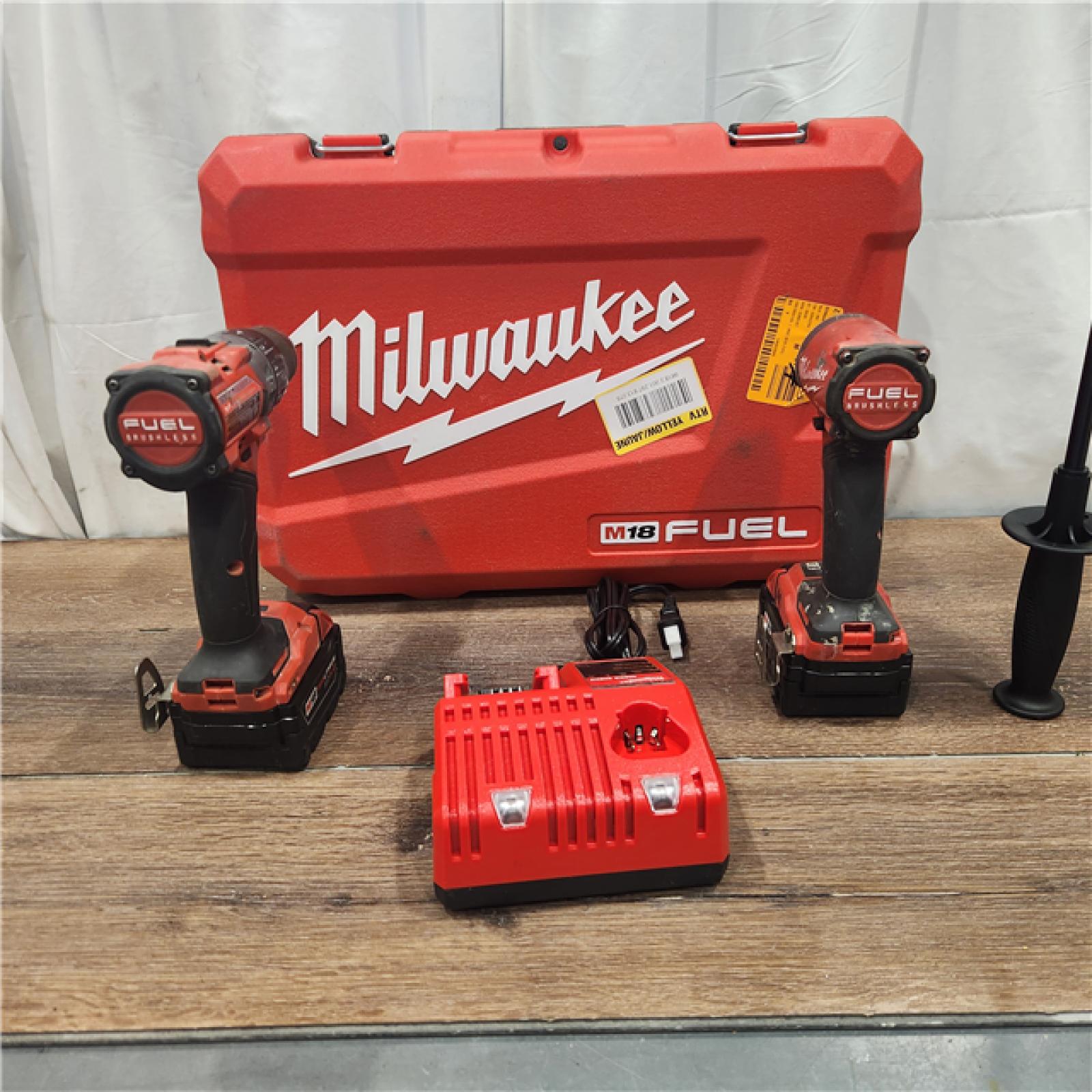 AS IS Milwaukee M18 FUEL 18V Lithium-Ion Brushless Cordless Hammer Drill and Impact Driver Combo Kit (2-Tool) with 2 Batteries