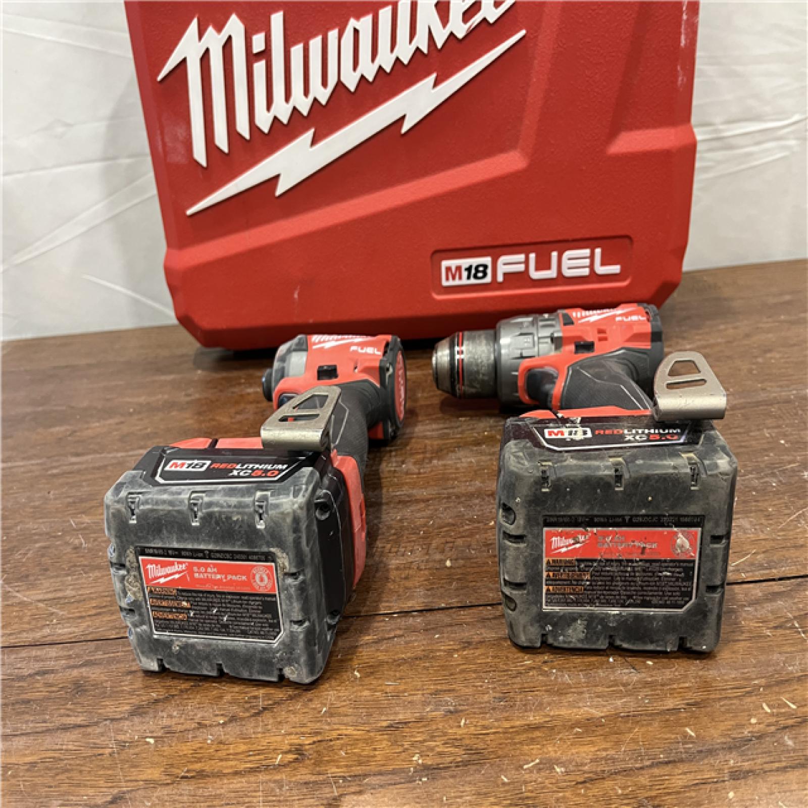 AS-IS Milwaukee M18 FUEL 18V Lithium-Ion Brushless Cordless Hammer Drill and Impact Driver Combo Kit (2-Tool) with 2 Batteries