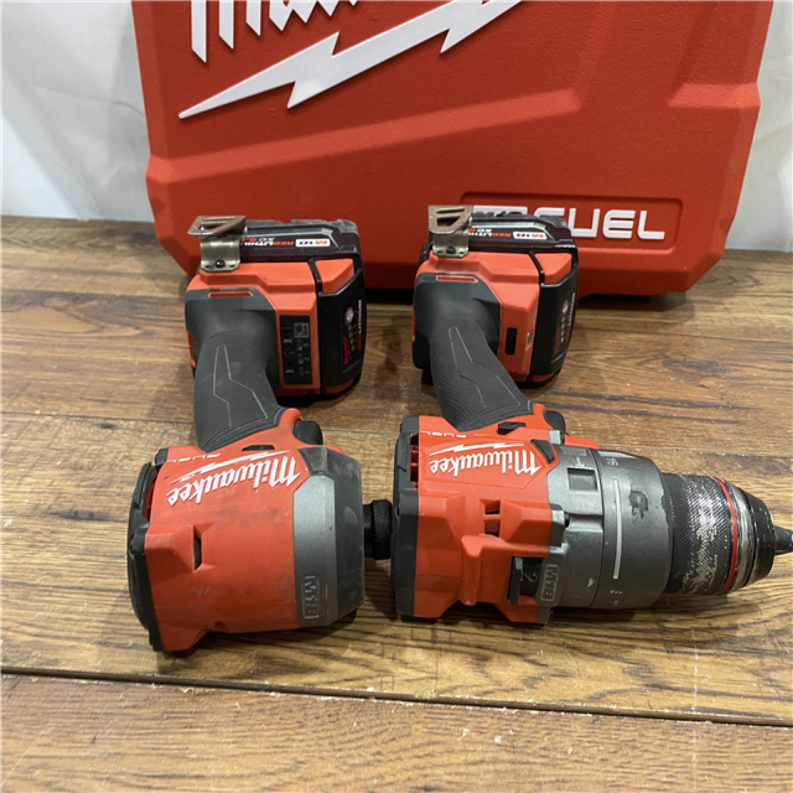 AS IS Milwaukee M18 FUEL 18V Lithium-Ion Brushless Cordless Hammer Drill and Impact Driver Combo Kit (2-Tool) with 2 Batteries