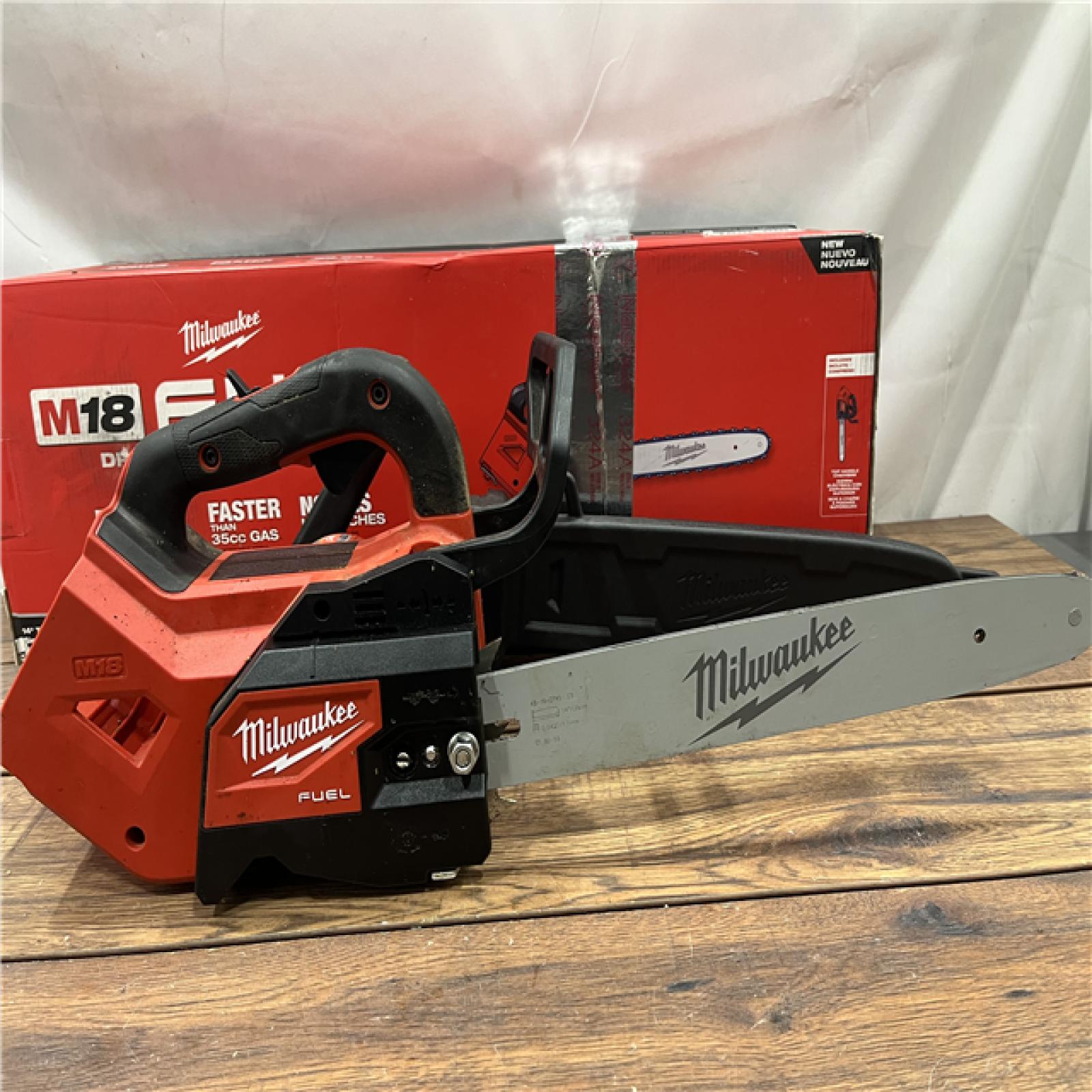 AS-IS Milwaukee Tool 2826-20T M18 FUEL 14  Top Handle 18-Volt Lithium-Ion Brushless Electric Cordless Chainsaw (Tool-Only)