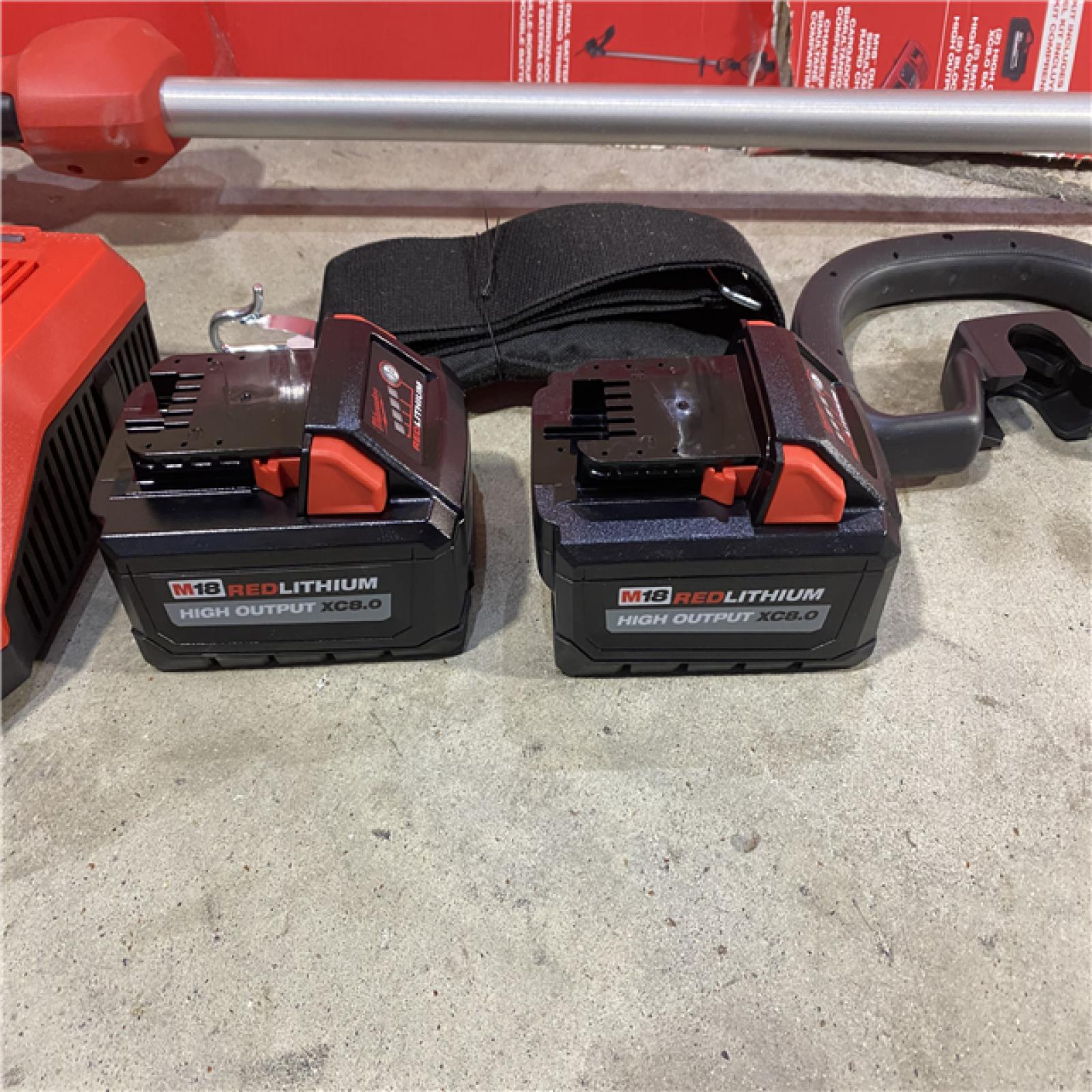 HOUSTON LOCATION -AS-IS M18 FUEL 18V Brushless Cordless 17 in. Dual Battery Straight Shaft String Trimmer with (2) 8.0 Ah Batteries and Charger