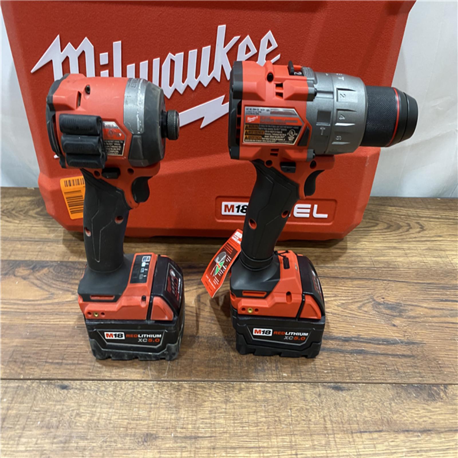 AS IS Milwaukee M18 FUEL 18V Lithium-Ion Brushless Cordless Hammer Drill and Impact Driver Combo Kit (2-Tool) with 2 Batteries