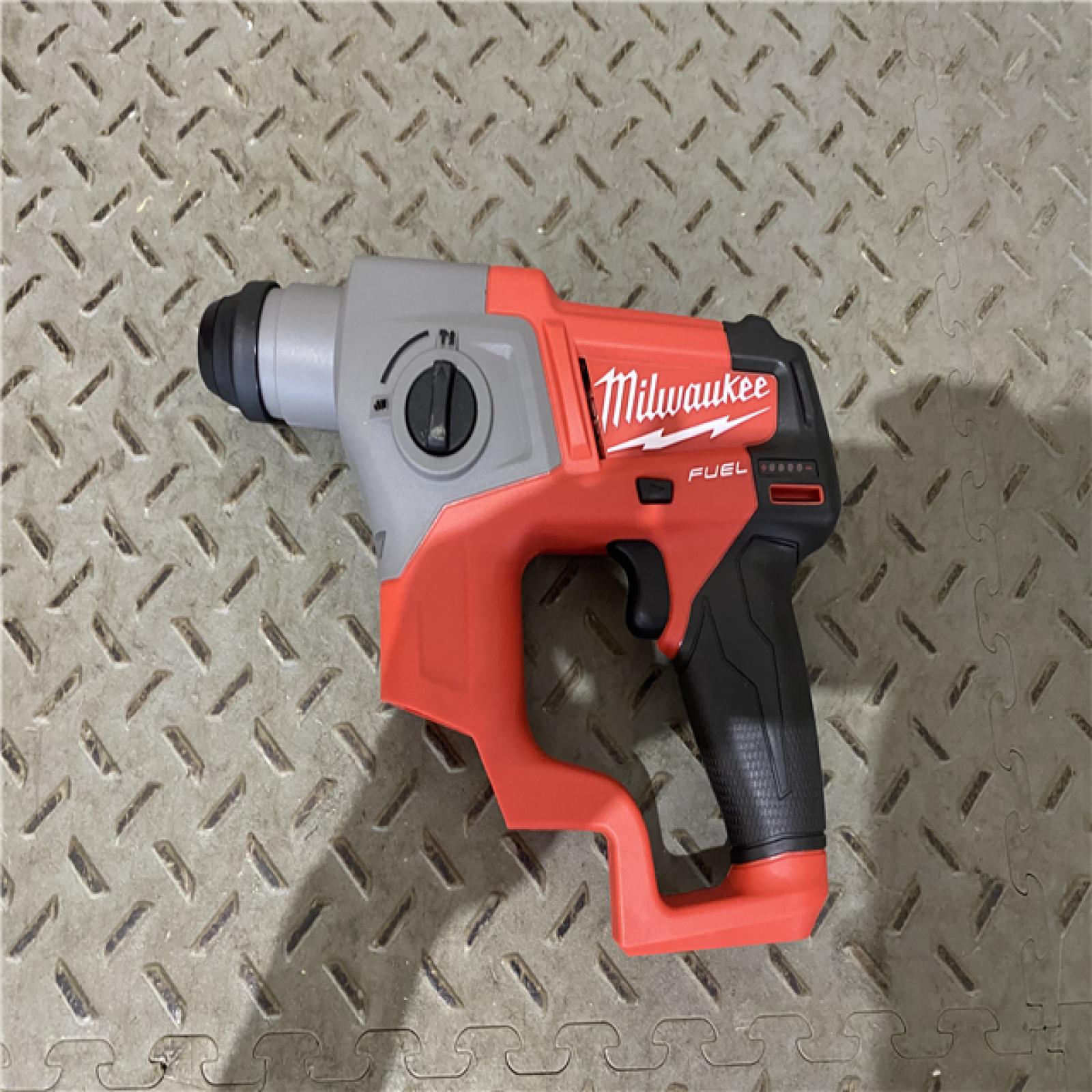 Houston location AS-IS Milwaukee 2915-20 M18 FUEL 18-Volt Lithium-Ion Brushless Cordless SDS-Plus 1-1/8 in. Rotary Hammer Drill (Tool-Only)