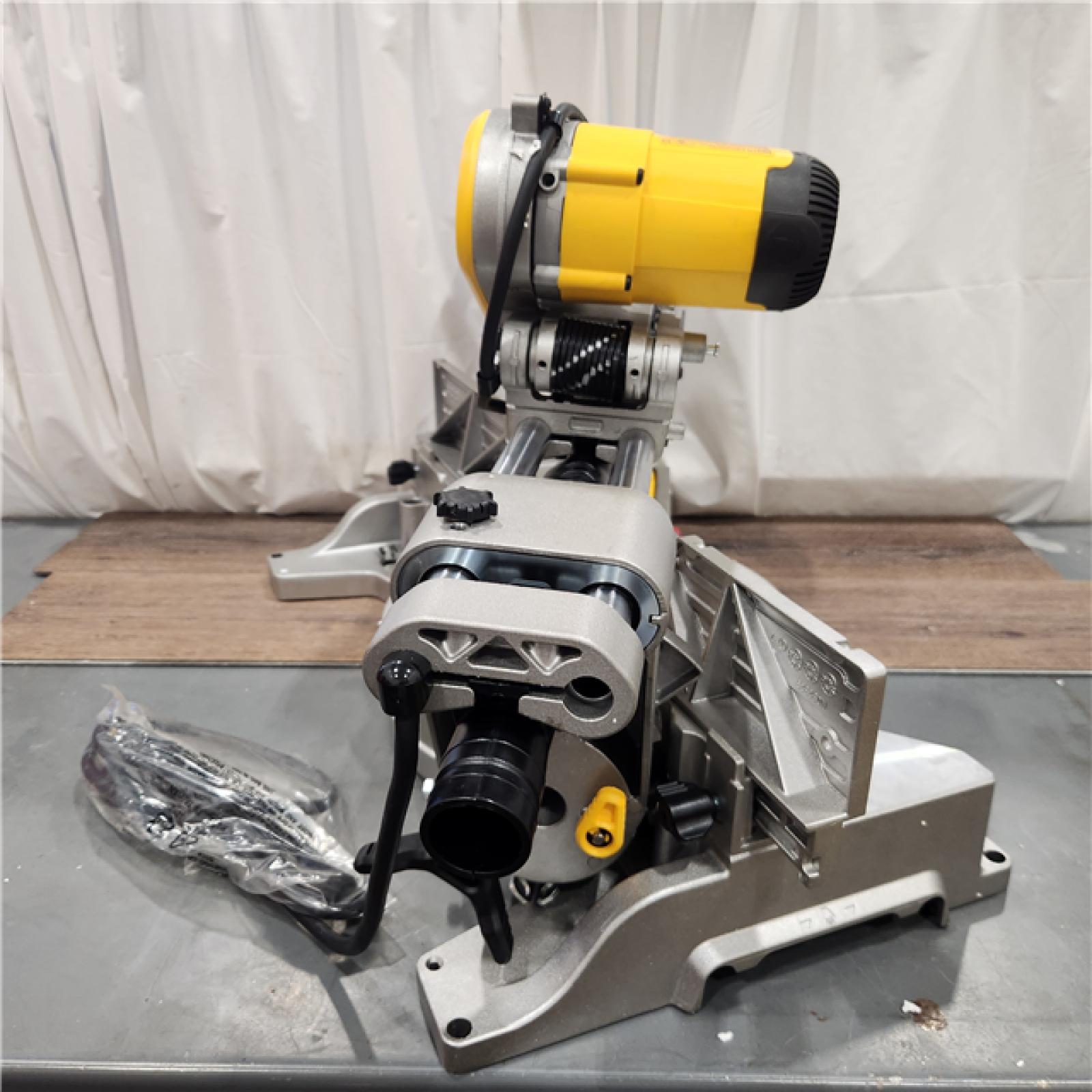 AS IS DEWALT 15 Amp Corded 12 in. Double Bevel Sliding Compound Miter Saw, Blade Wrench and Material Clamp