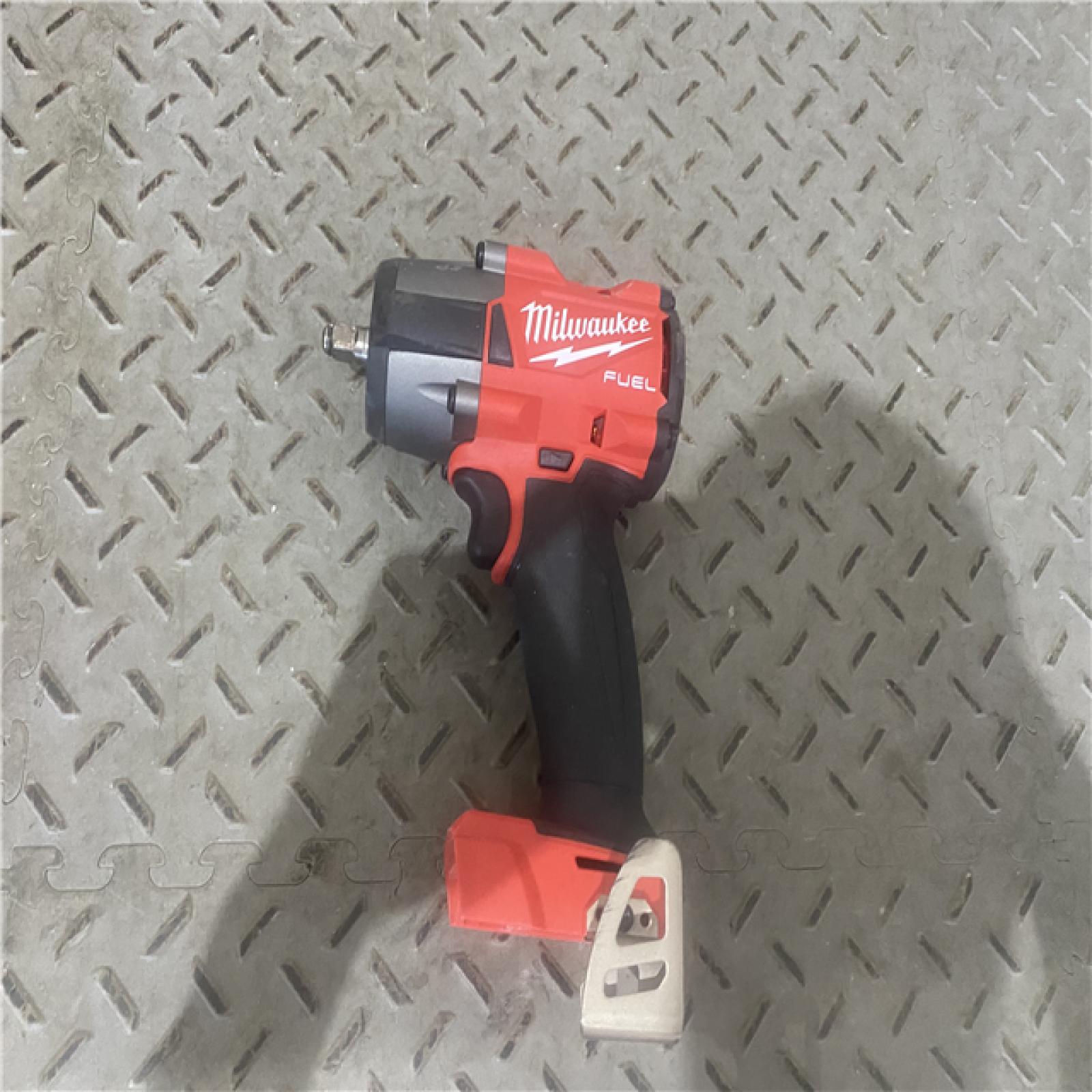 Houston location AS-IS Milwaukee M18 18V Fuel 1/2  Mid-Torque Impact Wrench Cordless Lithium-Ion Brushless with Friction Ring 2962-20