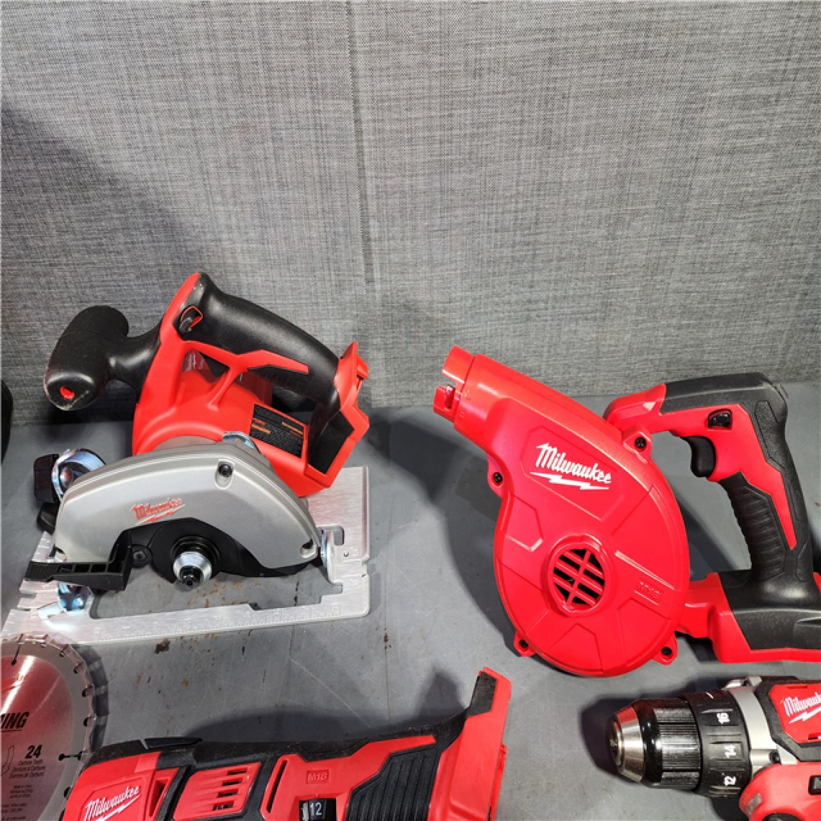 HOUSTON LOCATION - AS-IS M18 18-Volt Lithium-Ion Cordless Combo Kit (9-Tool) with (2) Batteries, Charger, and Tool Bag