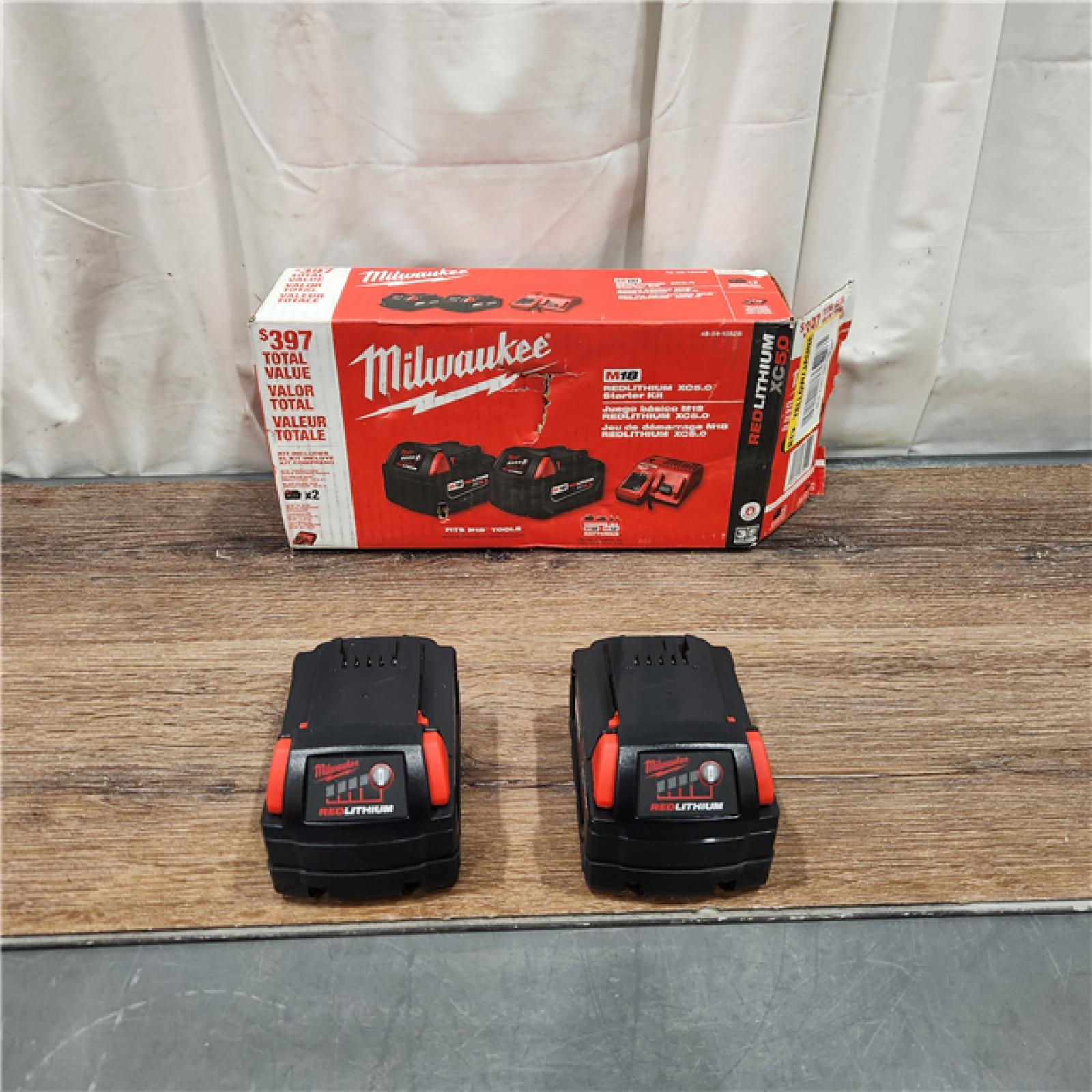 AS IS M18 18-Volt Lithium-Ion XC Starter Kit with Two 5.0Ah Batteries and Charger