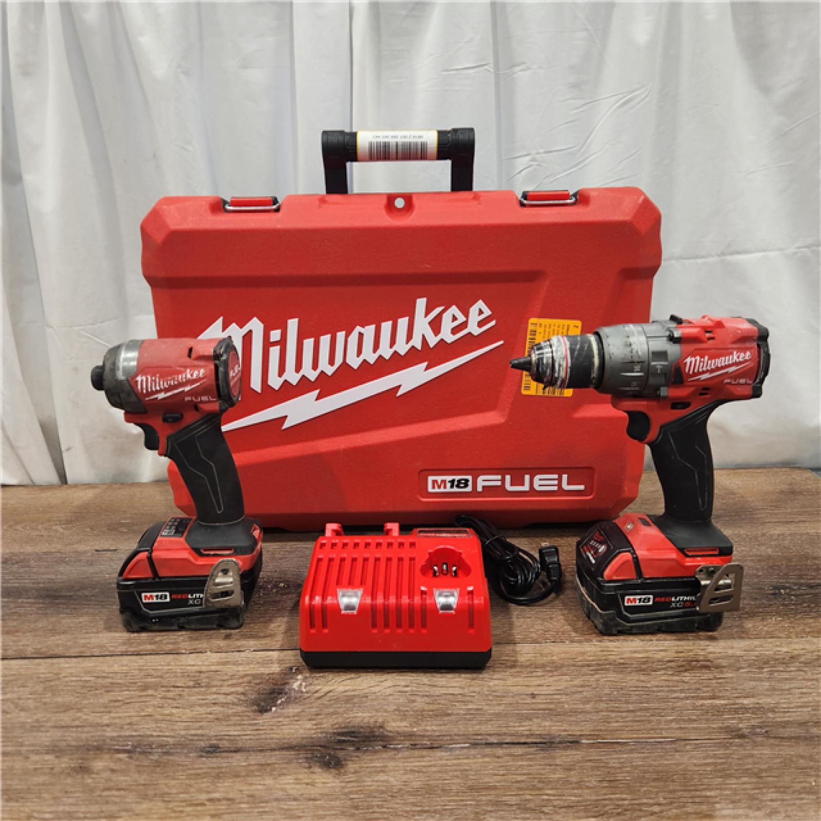 AS IS Milwaukee M18 FUEL 18V Lithium-Ion Brushless Cordless Hammer Drill and Impact Driver Combo Kit (2-Tool) with 2 Batteries