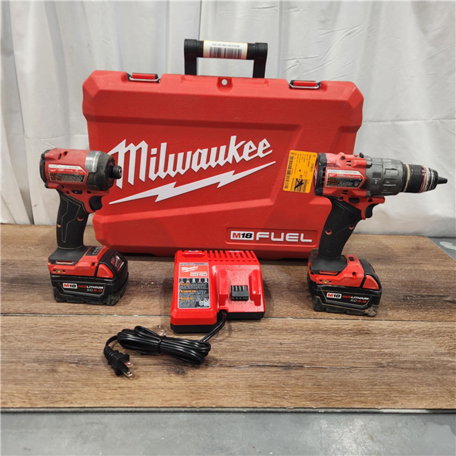 AS IS Milwaukee M18 FUEL 18V Lithium-Ion Brushless Cordless Hammer Drill and Impact Driver Combo Kit (2-Tool) with 2 Batteries