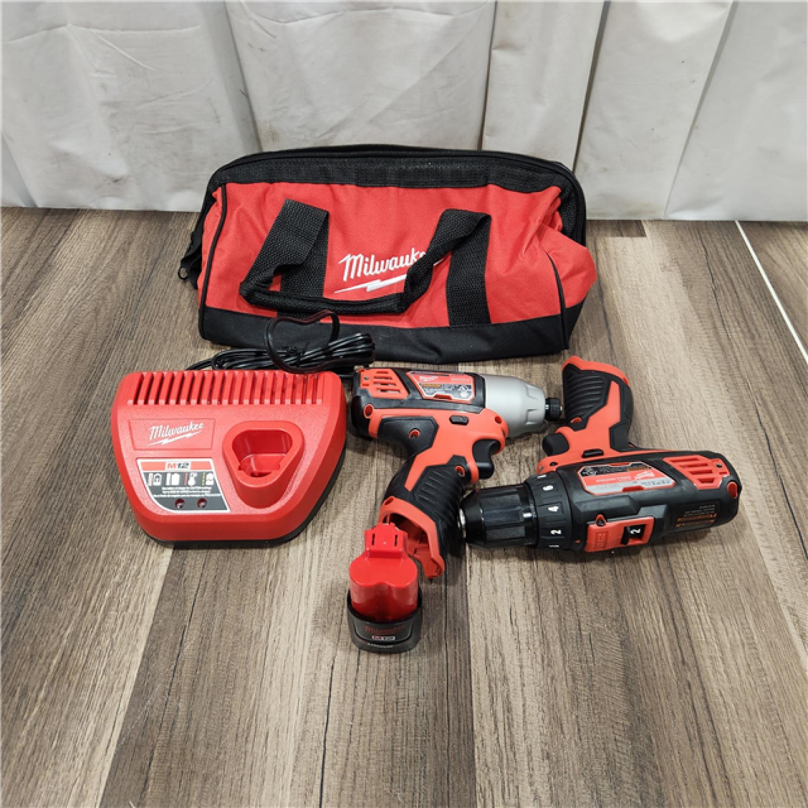 AS IS M12 12V Lithium-Ion Cordless Drill Driver/Impact Driver Combo Kit with Two 1.5Ah Batteries, Charger and Bag (2-Tool)