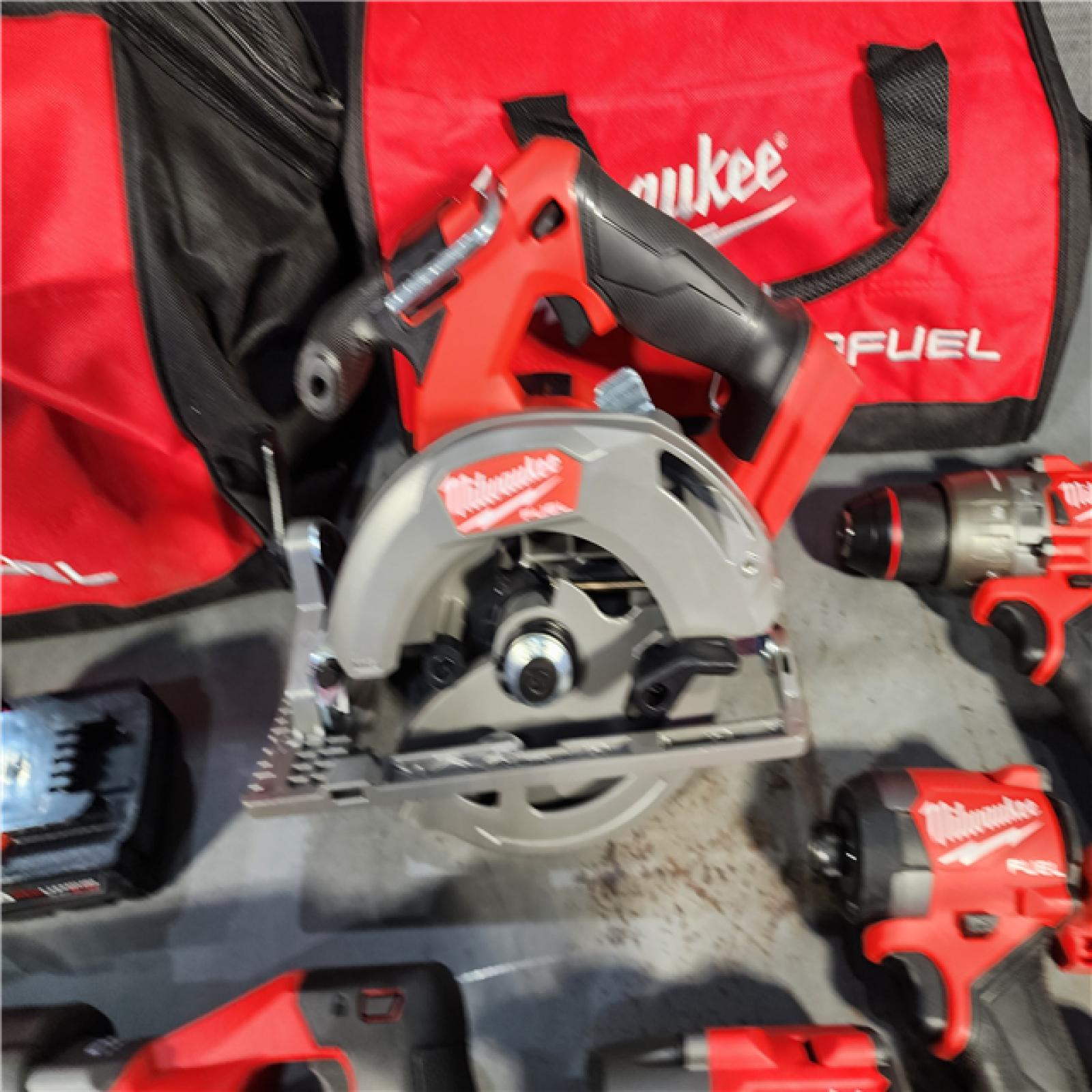 HOUSTON LOCATION - AS-IS (APPEARS LIKE NEW) MILWAUKEE 7 TOOL COMBO KIT W/ (2) 5.0 AH BATTERY, (2) CARRYING BAG & CHARGER