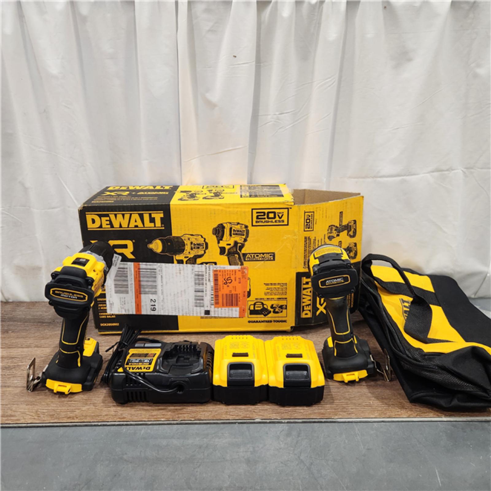 AS IS DEWALT 20V MAX XR Hammer Drill and ATOMIC Impact Driver 2 Tool Cordless Combo Kit with (2) 4.0Ah Batteries, Charger, and Bag