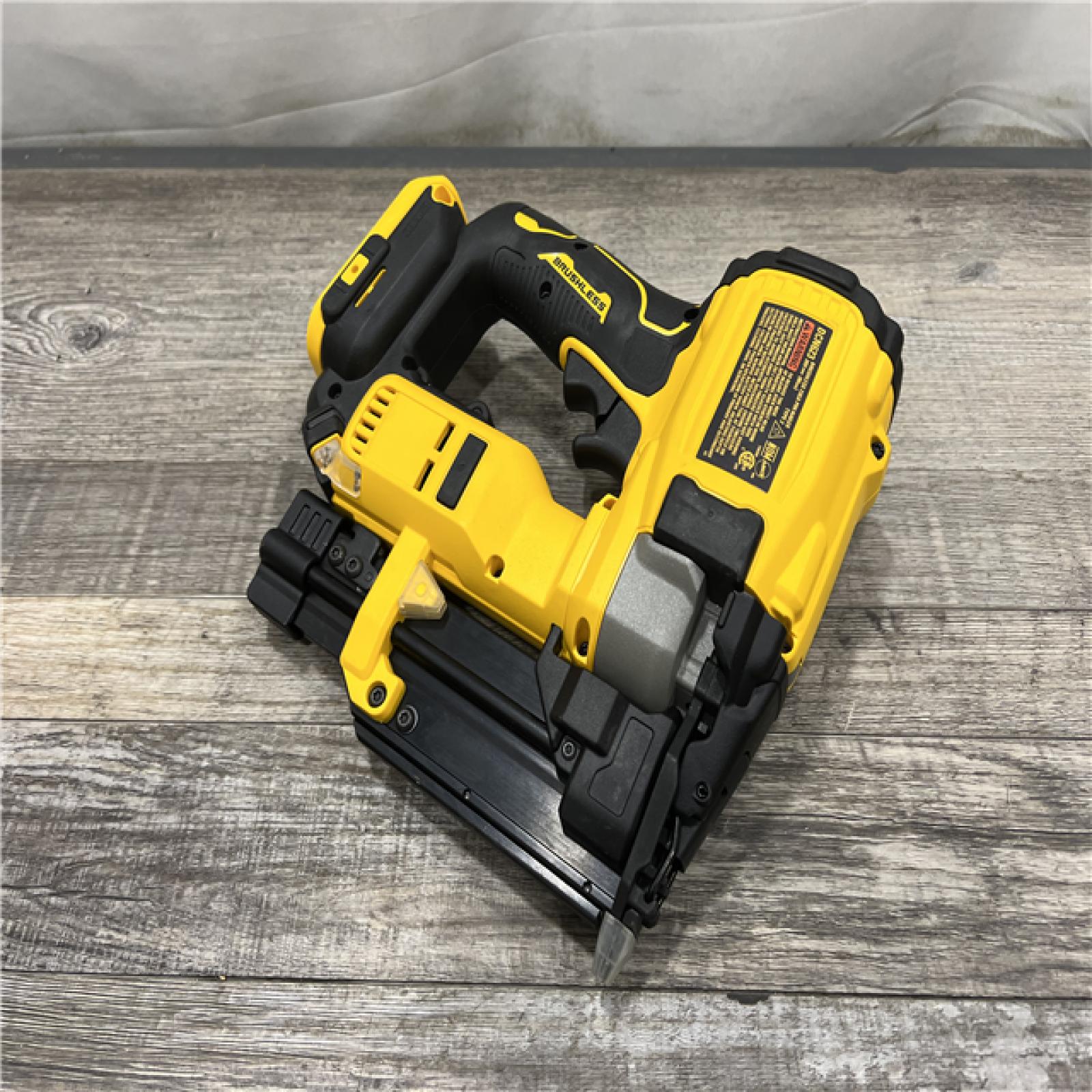 AS-IS DEWALT ATOMIC 20V MAX Lithium Ion Cordless 23 Gauge Pin Nailer Kit with 2.0Ah Battery and Charger