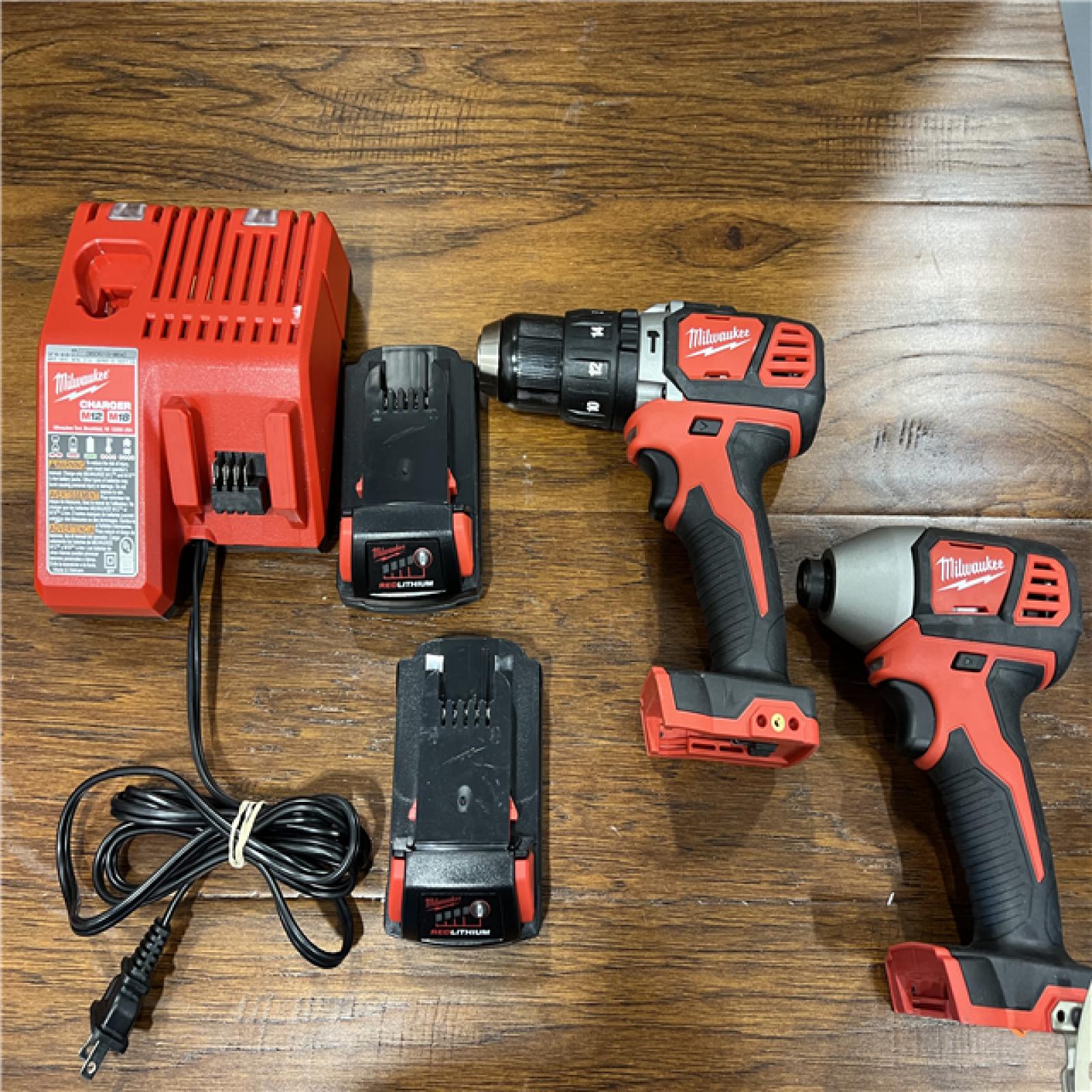 AS-IS Milwaukee M18 Brushed Cordless (2-Tool) Drill/Driver and Impact Driver Kit