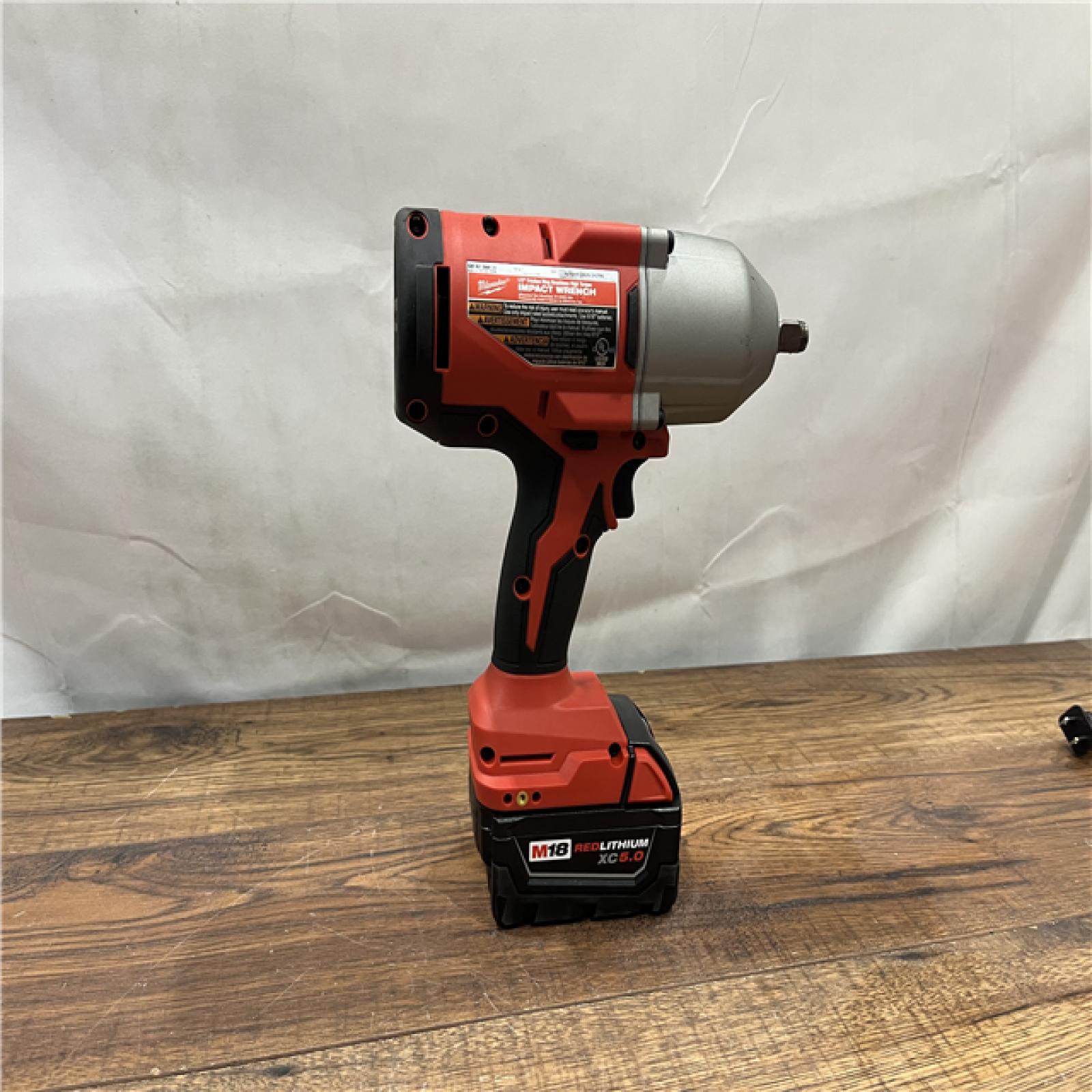 AS-IS Milwaukee 2666-20 M18 18-Volt Lithium-Ion Brushless 1/2 in. High Torque Impact Wrench with Friction Ring (Tool-Only)