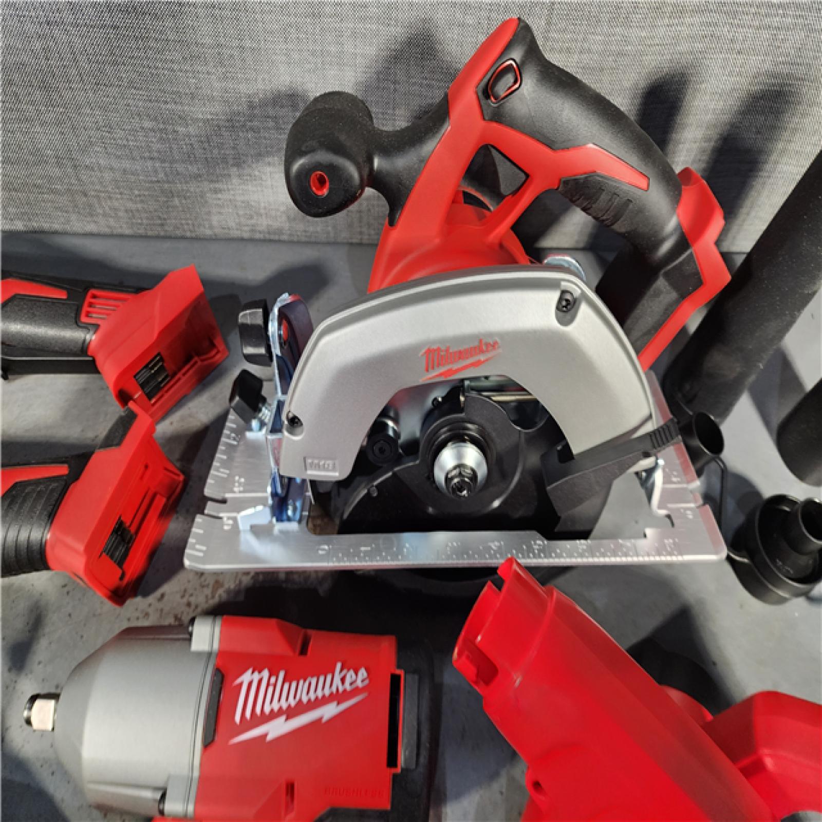 HOUSTON LOCATION - AS-IS (APPEARS LIKE NEW) M18 18-Volt Lithium-Ion Cordless Combo Kit 9-Tool with 2-Batteries, Charger and Tool Bag