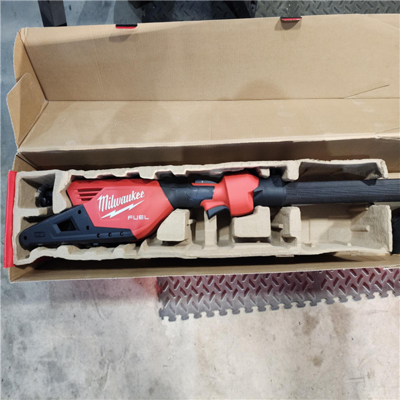 HOUSTON LOCATION - AS-IS (APPEARS LIKE NEW) Milwaukee M18 FUEL 10 in. 18V Lithium-Ion Brushless Electric Cordless Telescoping Pole Saw, 13 Ft. Length (Tool-Only)