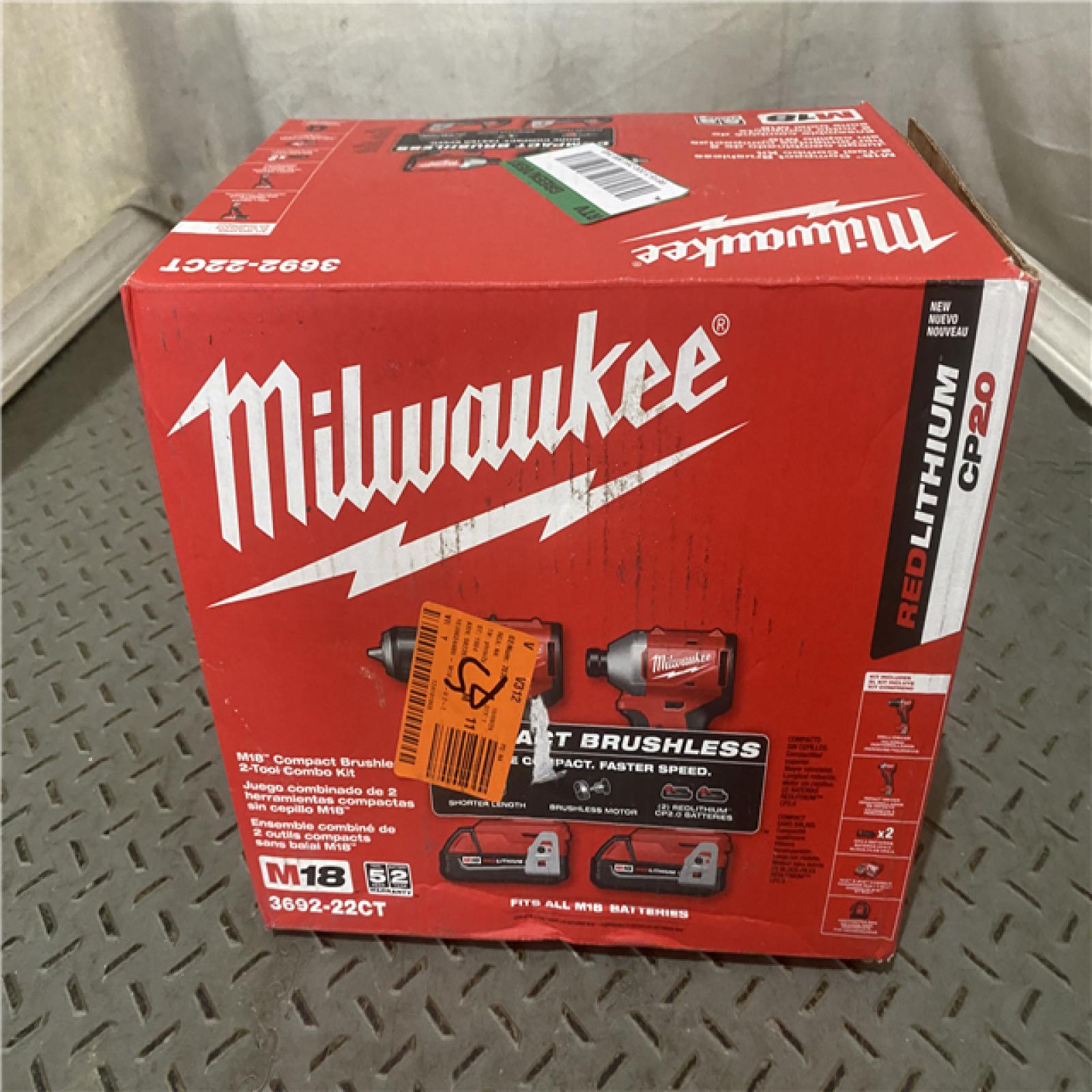 Houston location AS-IS Milwuakee M18 18V Lithium-Ion Brushless Cordless Compact Drill/Impact Combo Kit (2-Tool) W/(2) 2.0 Ah Batteries, Charger & Bag