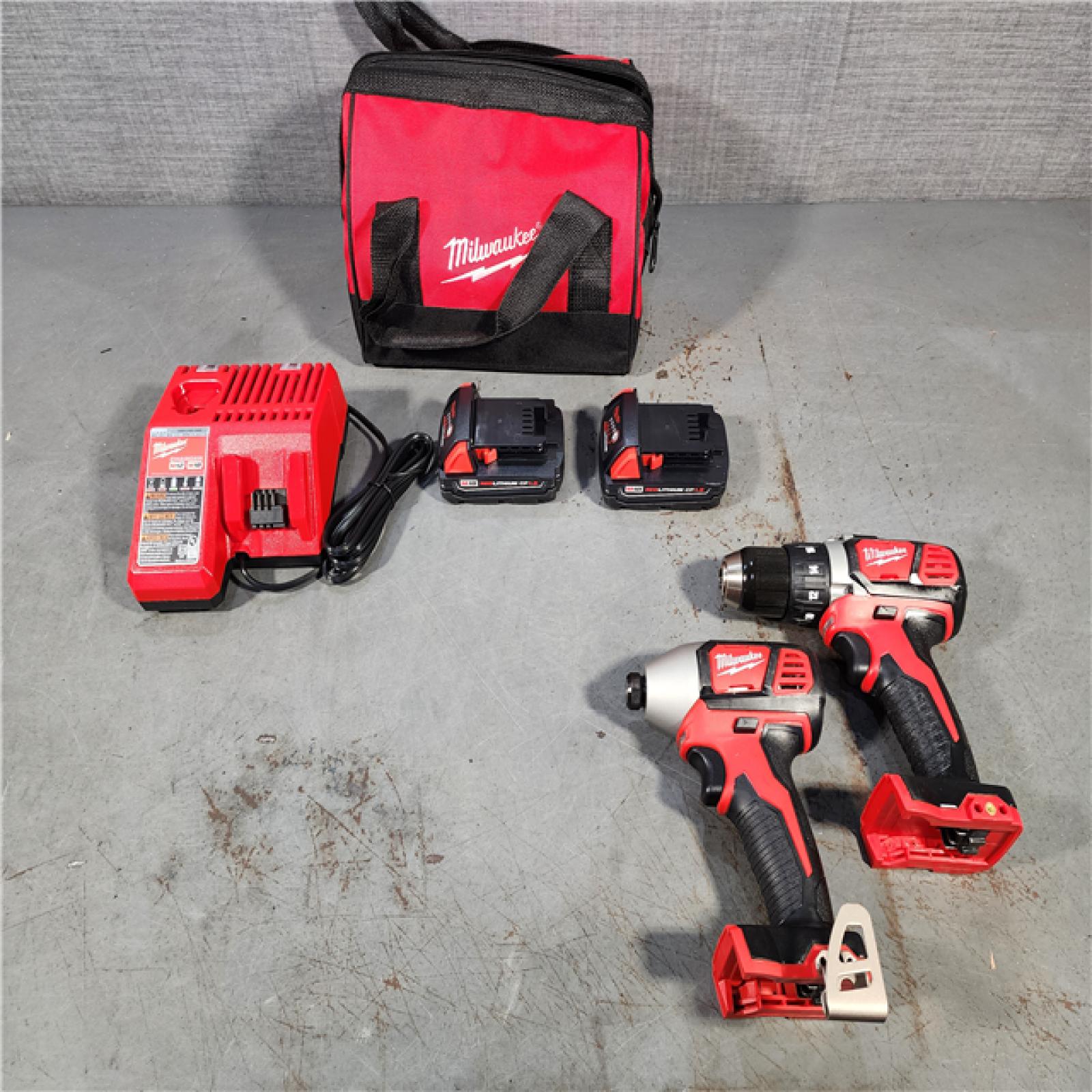 HOUSTON LOCATION - AS-IS Milwaukee M18 18V Cordless Brushed 2 Tool Drill/Driver and Impact Driver Kit