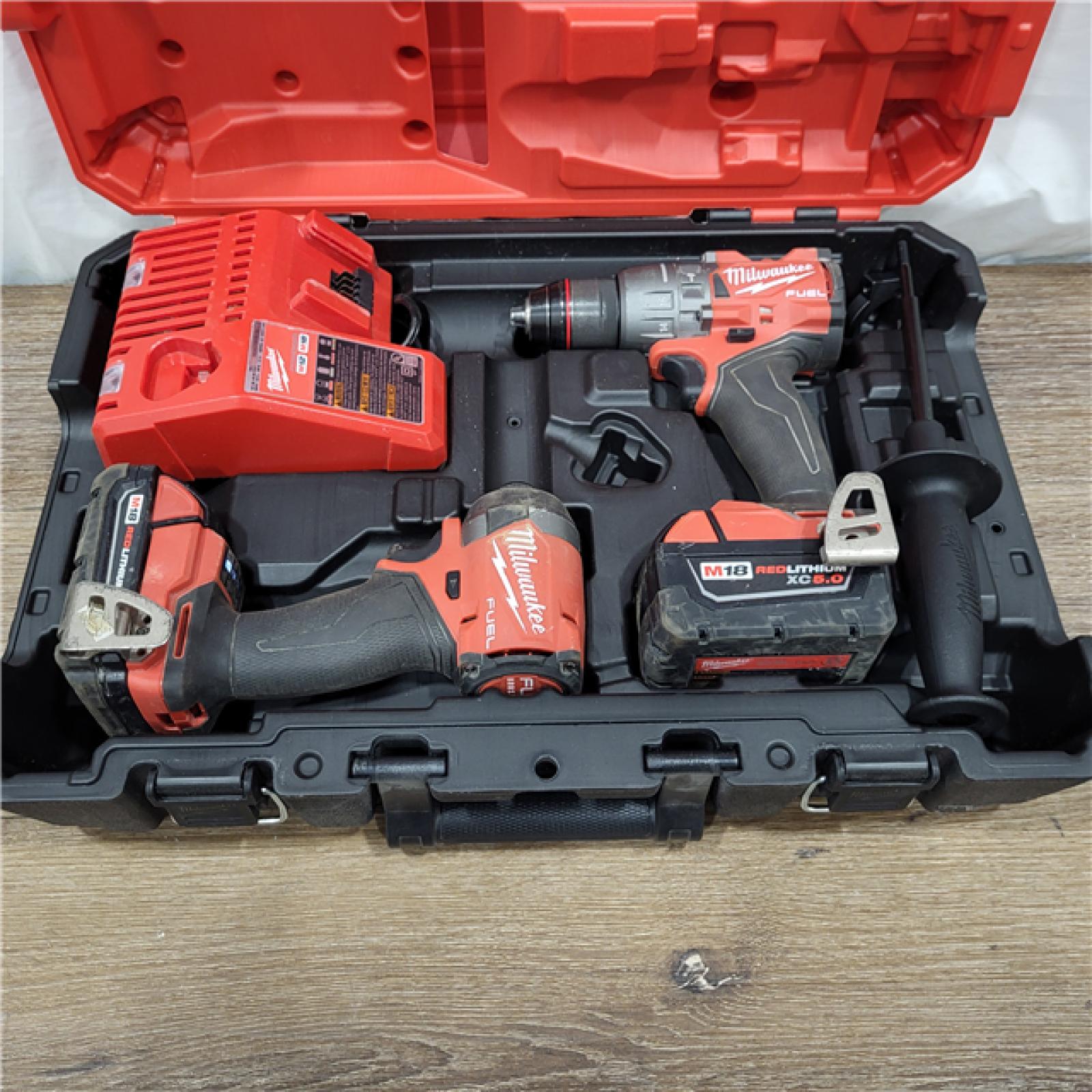 AS-IS M18 FUEL 18V Lithium-Ion Brushless Cordless Hammer Drill and Impact Driver Combo Kit (2-Tool) with 2 Batteries