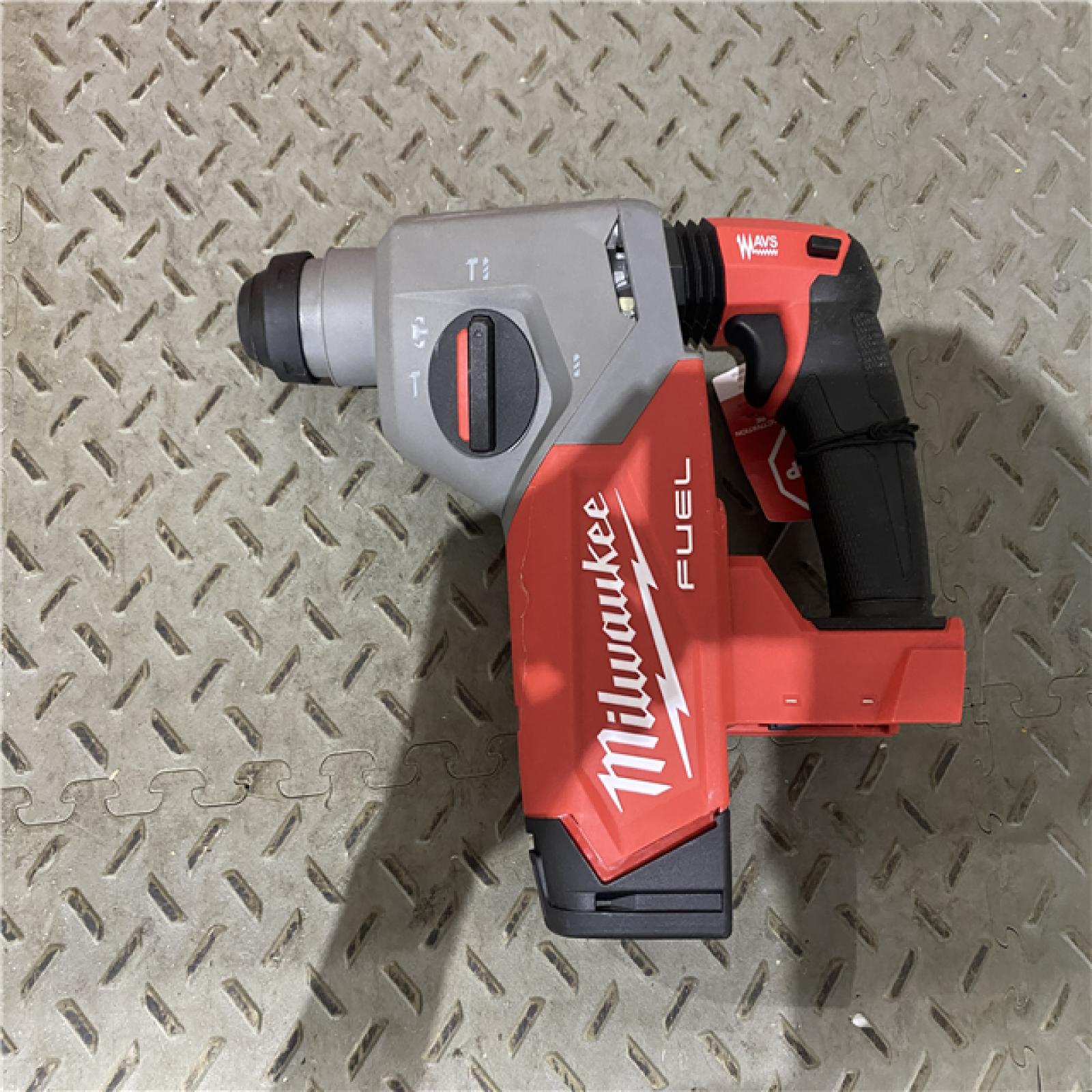 Houston location AS-IS Milwaukee 2915-20 M18 FUEL 18-Volt Lithium-Ion Brushless Cordless SDS-Plus 1-1/8 in. Rotary Hammer Drill (Tool-Only)