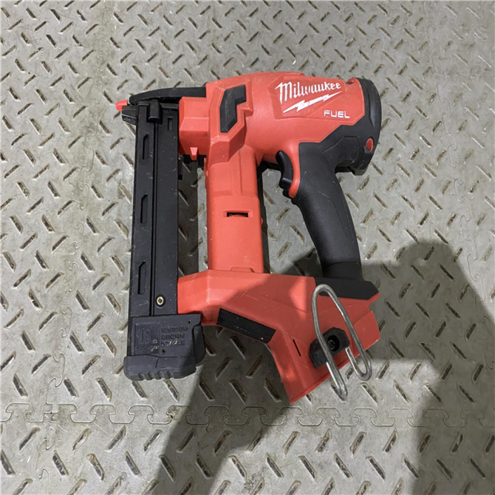 Houston location AS-IS MILWAUKEE M18 FUEL 18-Volt Lithium-Ion Brushless Cordless 18-Gauge 1/4 in. Narrow Crown Stapler (Tool-Only)