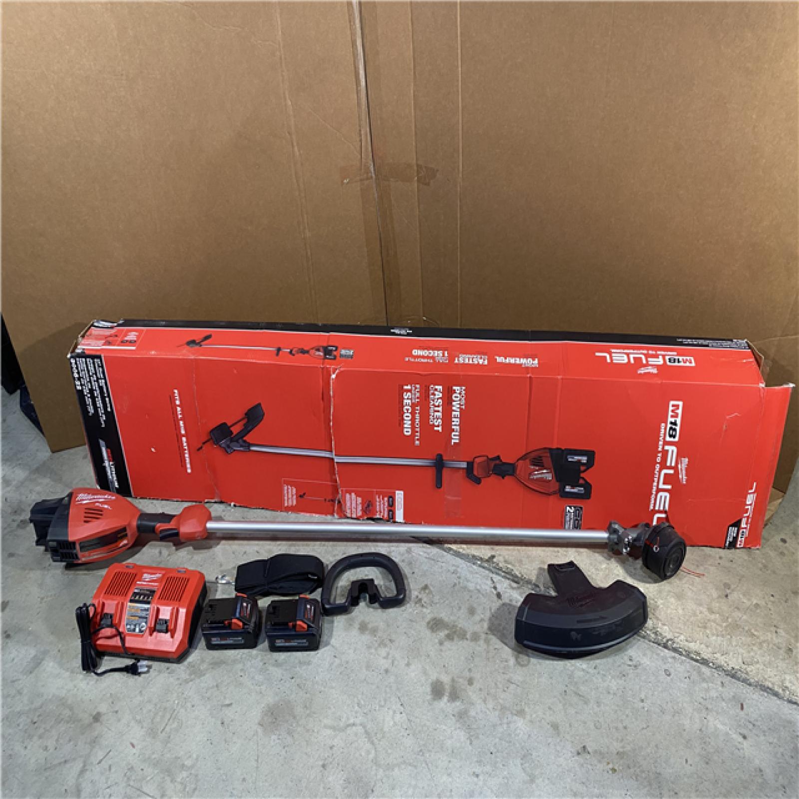 HOUSTON LOCATION -AS-IS M18 FUEL 18V Brushless Cordless 17 in. Dual Battery Straight Shaft String Trimmer with (2) 8.0 Ah Batteries and Charger