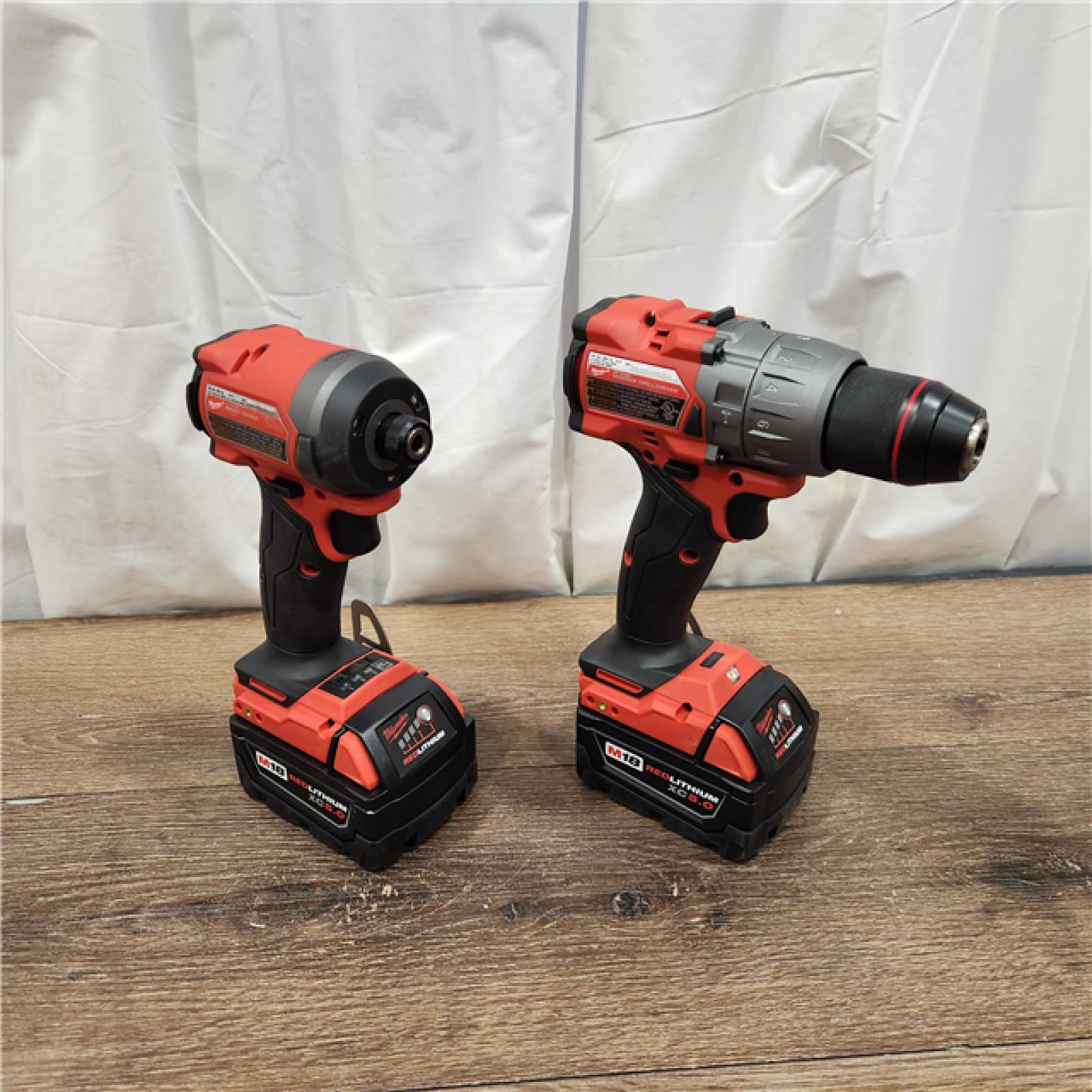 AS-IS Milwaukee M18 FUEL 18V Lithium-Ion Brushless Cordless Hammer Drill and Impact Driver Combo Kit (2-Tool) with 2 Batteries