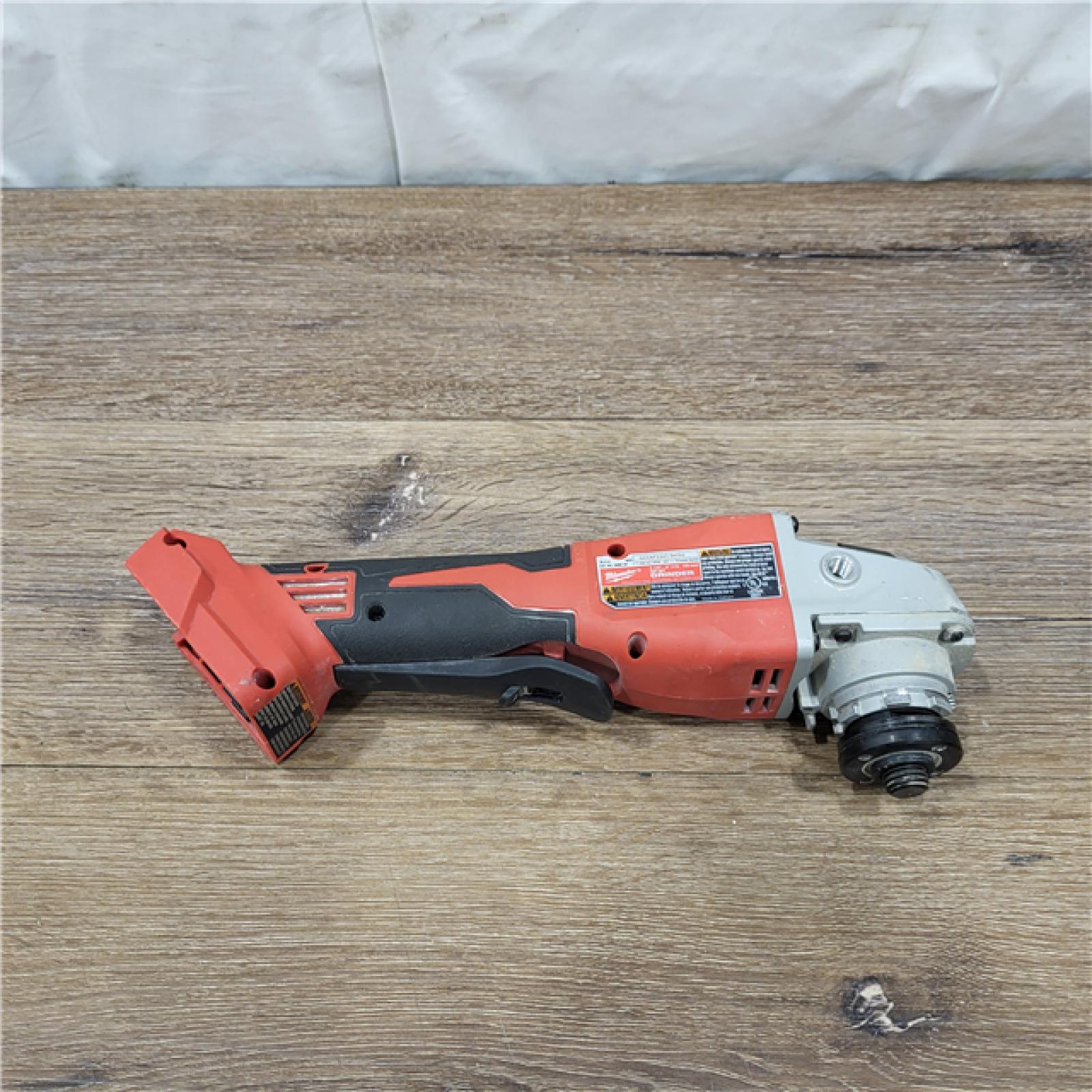 AS-IS Milwaukee 2880-20 M18 FUEL 18-Volt Lithium-Ion Brushless Cordless 4-1/2 in./5 in. Grinder W/Paddle Switch (Tool-Only)