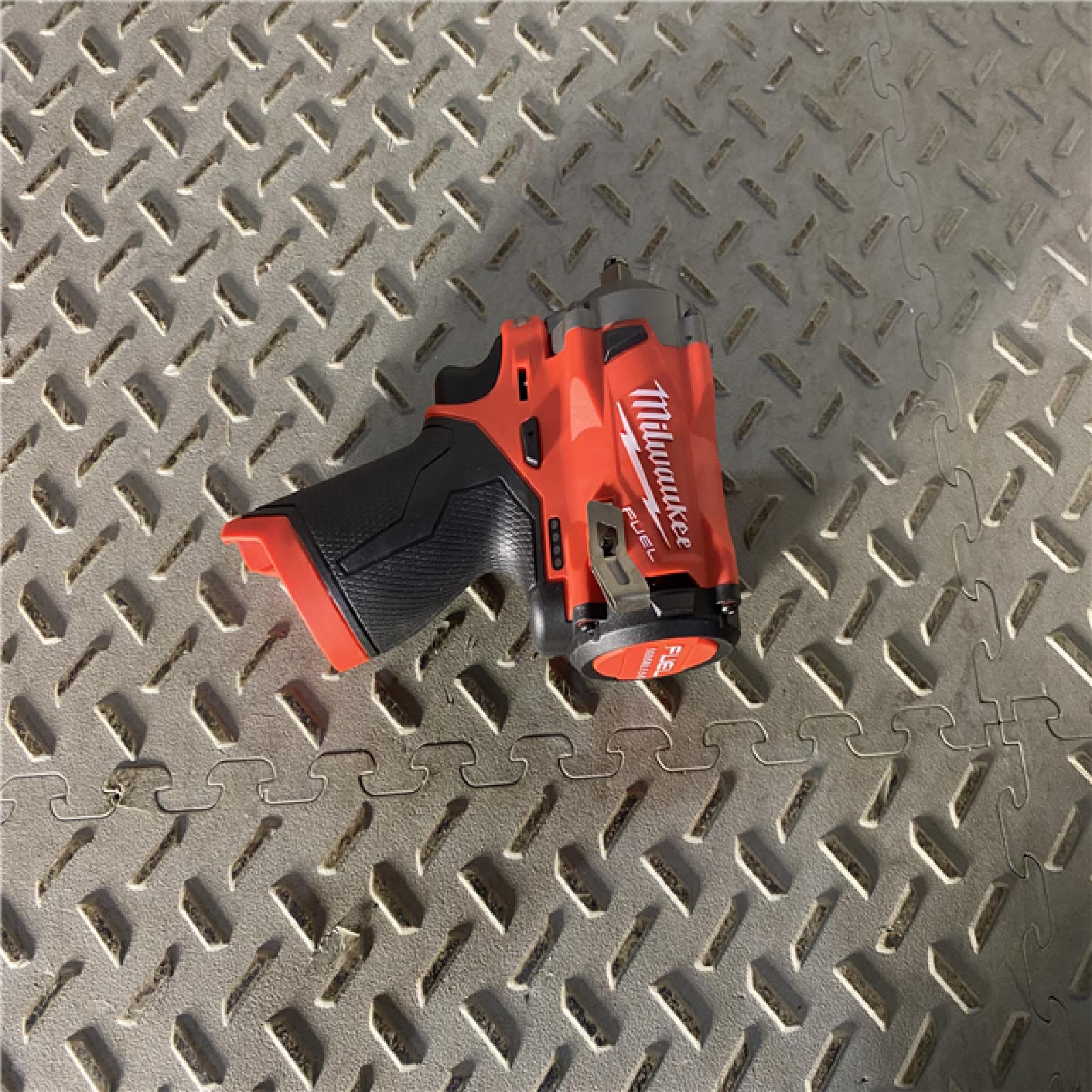 Houston location AS-IS MILWAUKEE M12 FUEL 12V Lithium-Ion Brushless Cordless Stubby 3/8 in. Impact Wrench (Tool-Only)