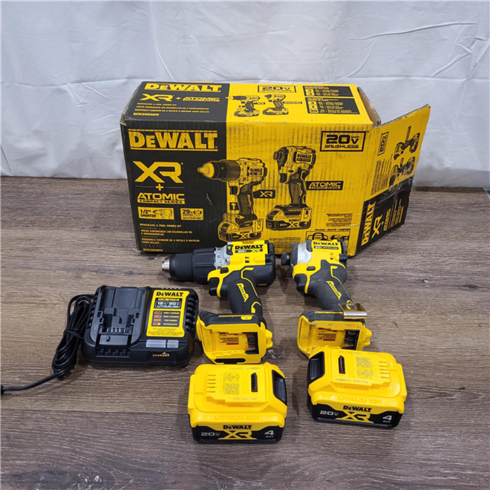 AS-IS DEWALT 20V MAX XR Hammer Drill and ATOMIC Impact Driver 2 Tool Cordless Combo Kit with (2) 4.0Ah Batteries, Charger, and Bag