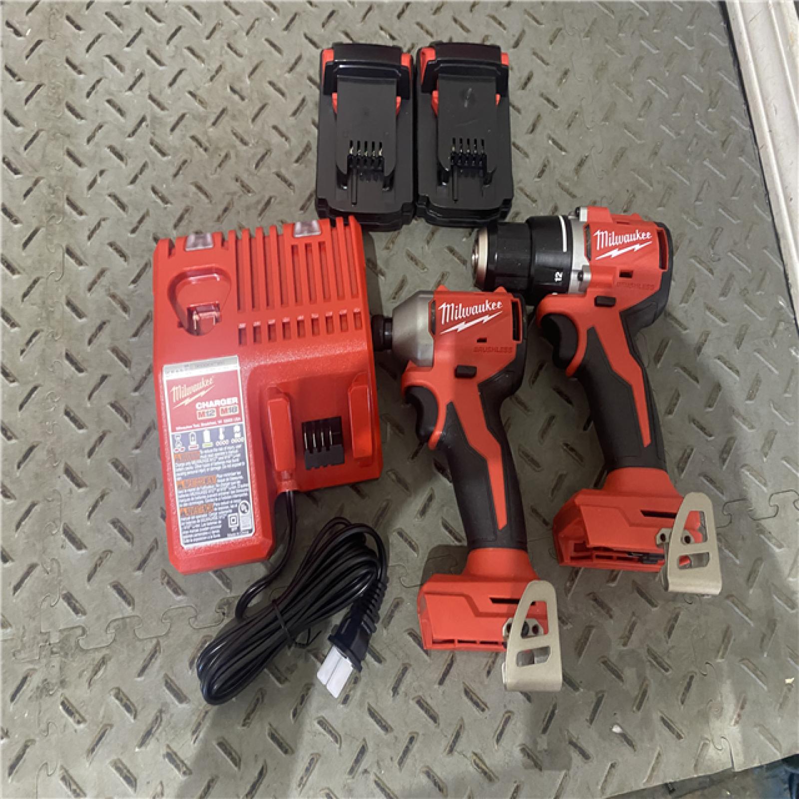 Houston location location AS-IS M18 18V Lithium-Ion Brushless Cordless Compact Drill/Impact Combo Kit (2-Tool) W/(2) 2.0 Ah Batteries, Charger & Bag