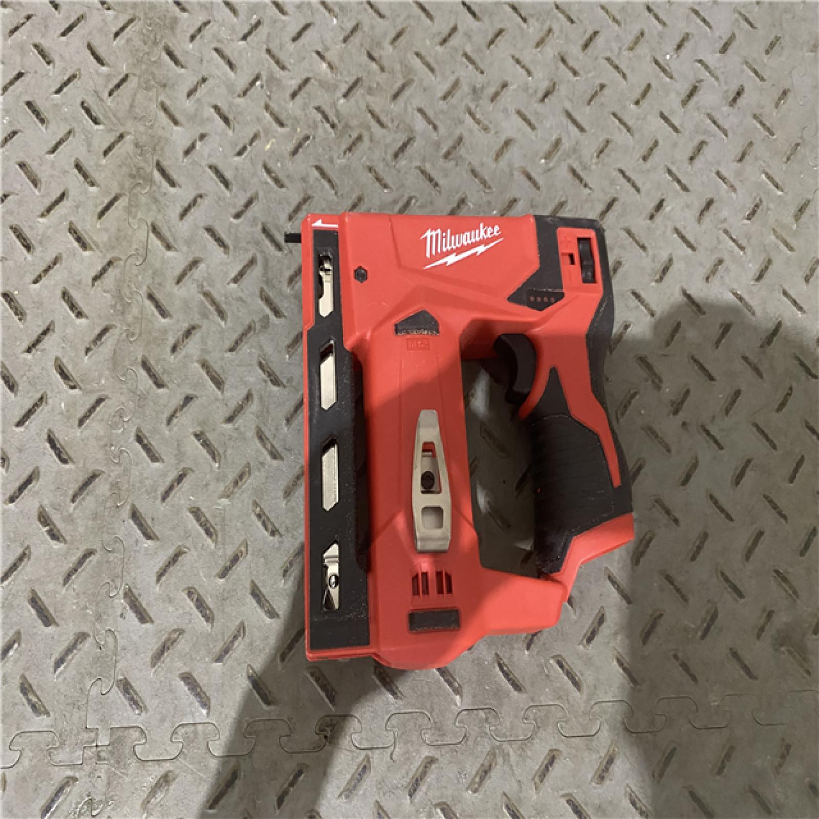 Houston location AS-IS MILWAUKEE M18 FUEL 18-Volt Lithium-Ion Brushless Cordless 18-Gauge 1/4 in. Narrow Crown Stapler (Tool-Only)