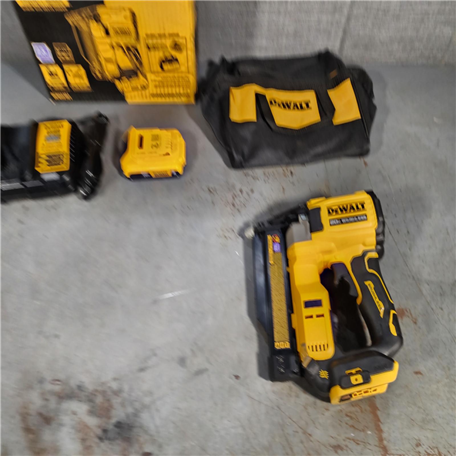 HOUSTON LOCATION - AS-IS DEWALT ATOMIC 20V MAX Lithium Ion Cordless 23 Gauge Pin Nailer Kit with 2.0Ah Battery and Charger