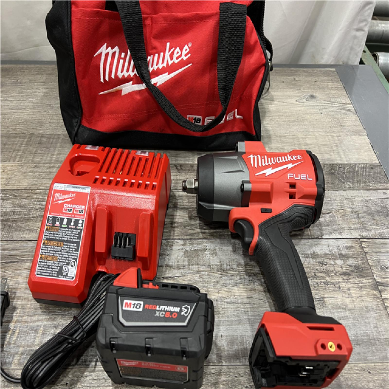 AS-IS Milwaukee M18 1/2 in. Cordless Brushless High Torque Impact Wrench Kit (Battery & Charger)