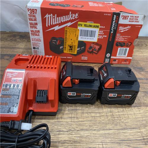 AS IS Milwaukee M18 18-Volt Lithium-Ion XC Starter Kit with Two 5.0Ah Batteries / Charger (48-59-1852B)