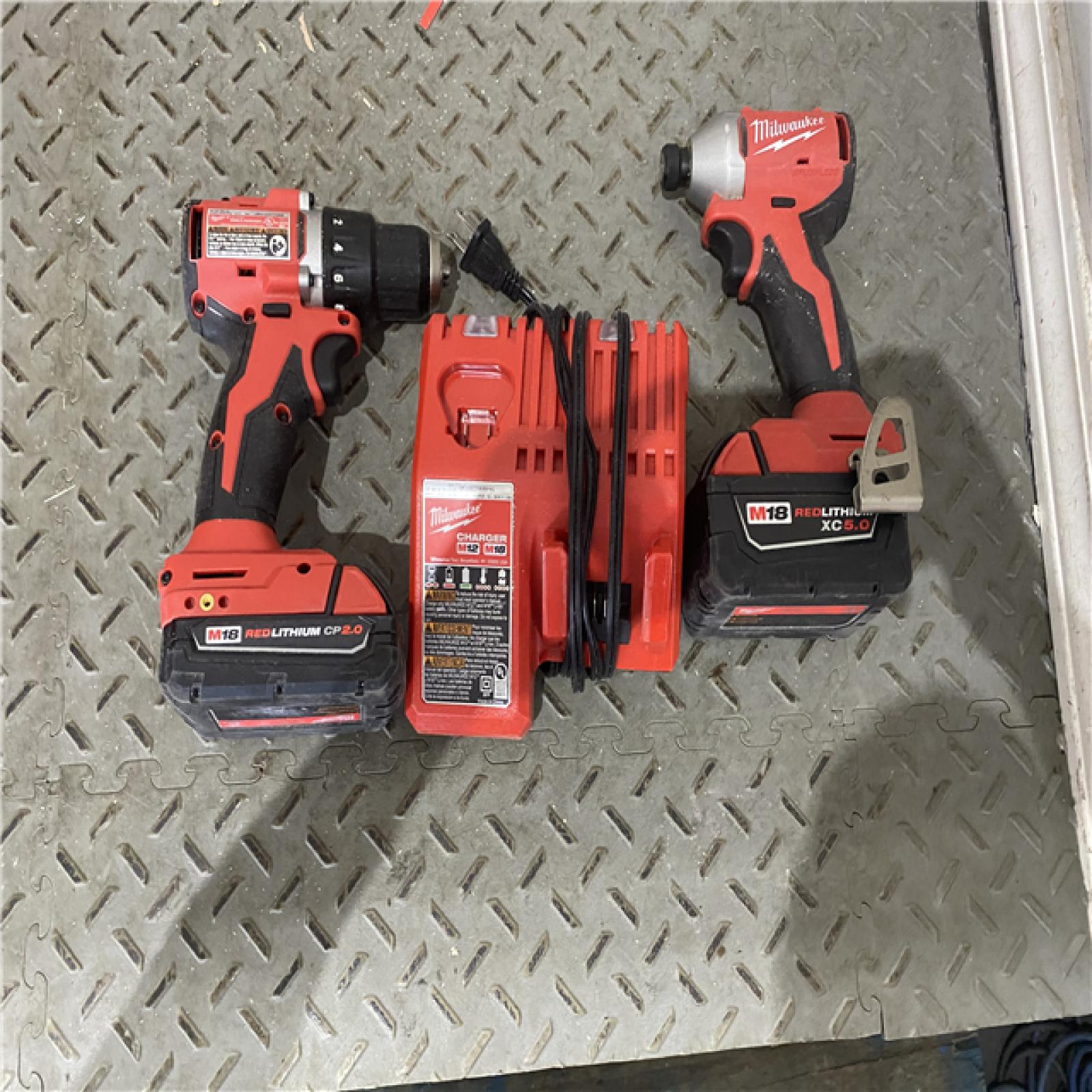 Houston location AS-IS MILWAUKEE M18 18V Lithium-Ion Brushless Cordless Compact Drill/Impact Combo Kit (2-Tool) W/(2) 2.0 Ah Batteries, Charger & Bag