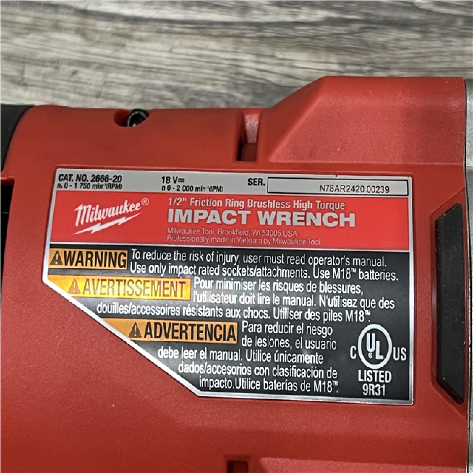 AS-IS MILWAUKEE  12/18V Lithium-Ion Cordless 3/8 in. Ratchet and 1/2 in. High Torque Impact Wrench with Friction Ring Combo Kit