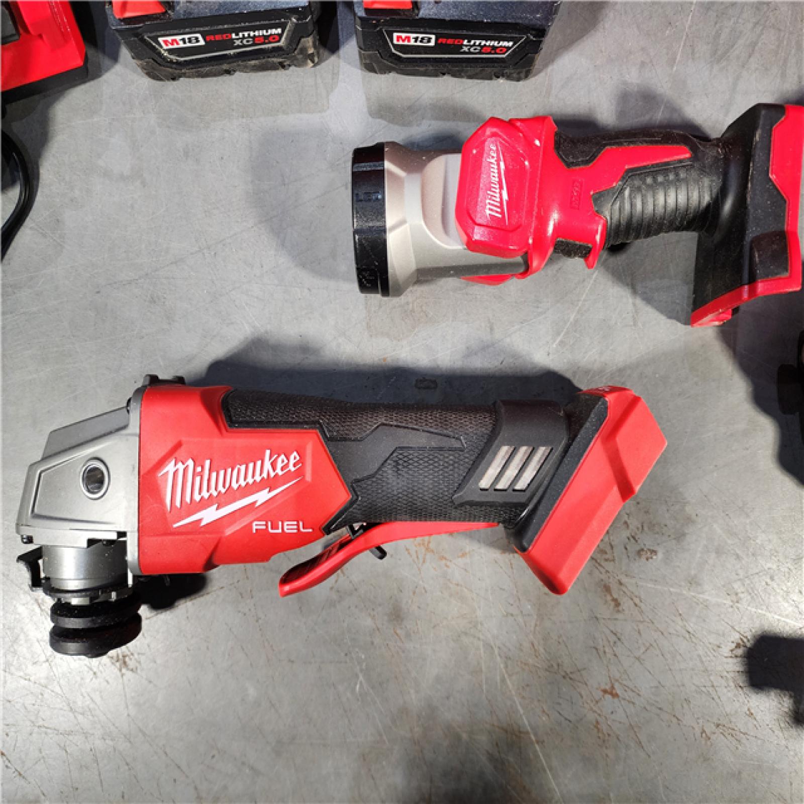 HOUSTON LOCATION - AS-IS MILWAUKEE 4 TOOL COMBO KIT W/ (2) BATTERY & CHARGER