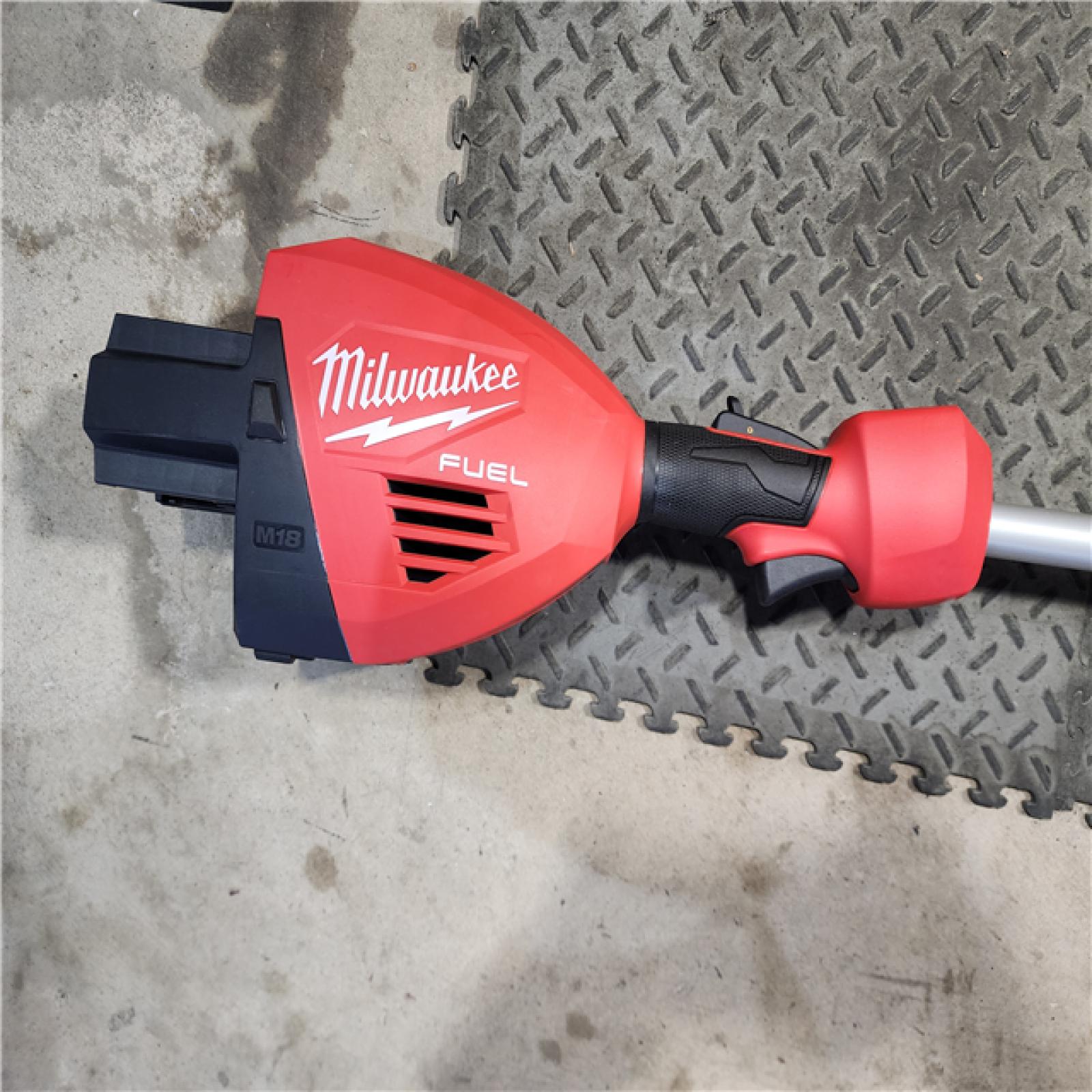 HOUSTON LOCATION - AS-IS (APPEARS LIKE NEW) Milwaukee M18 FUEL 18V Brushless Cordless 17 in. Dual Battery Straight Shaft String Trimmer (Tool-Only)