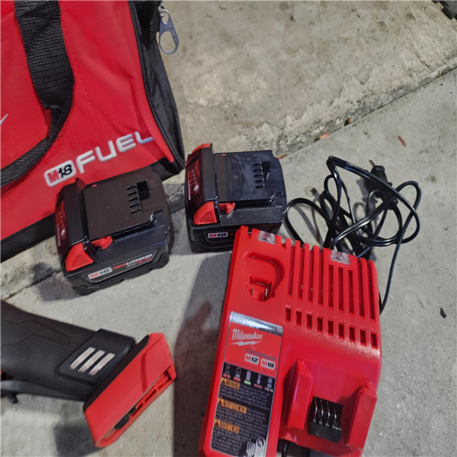 HOUSTON LOCATION - AS-IS (APPEARS LIKE NEW) Milwaukee M18 FUEL 18V Lithium-Ion Brushless Cordless Combo Kit with Two 5.0 Ah Batteries  1 Charger  2 Tool Bags (7-Tool)